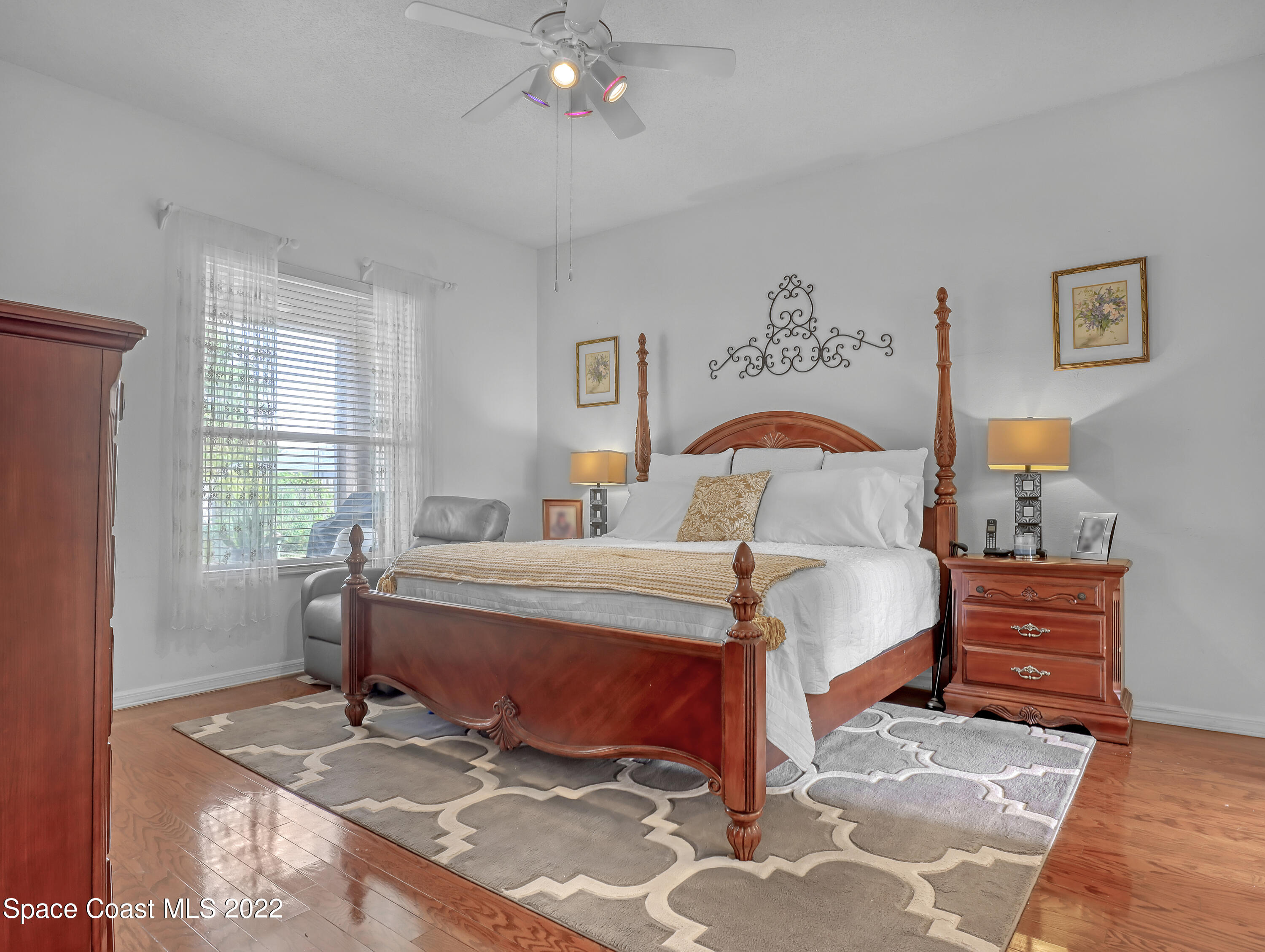 755 Raleigh Road Southeast Palm Bay, FL 32909 - Photo 21 of 36 a bedroom with a bed and a window