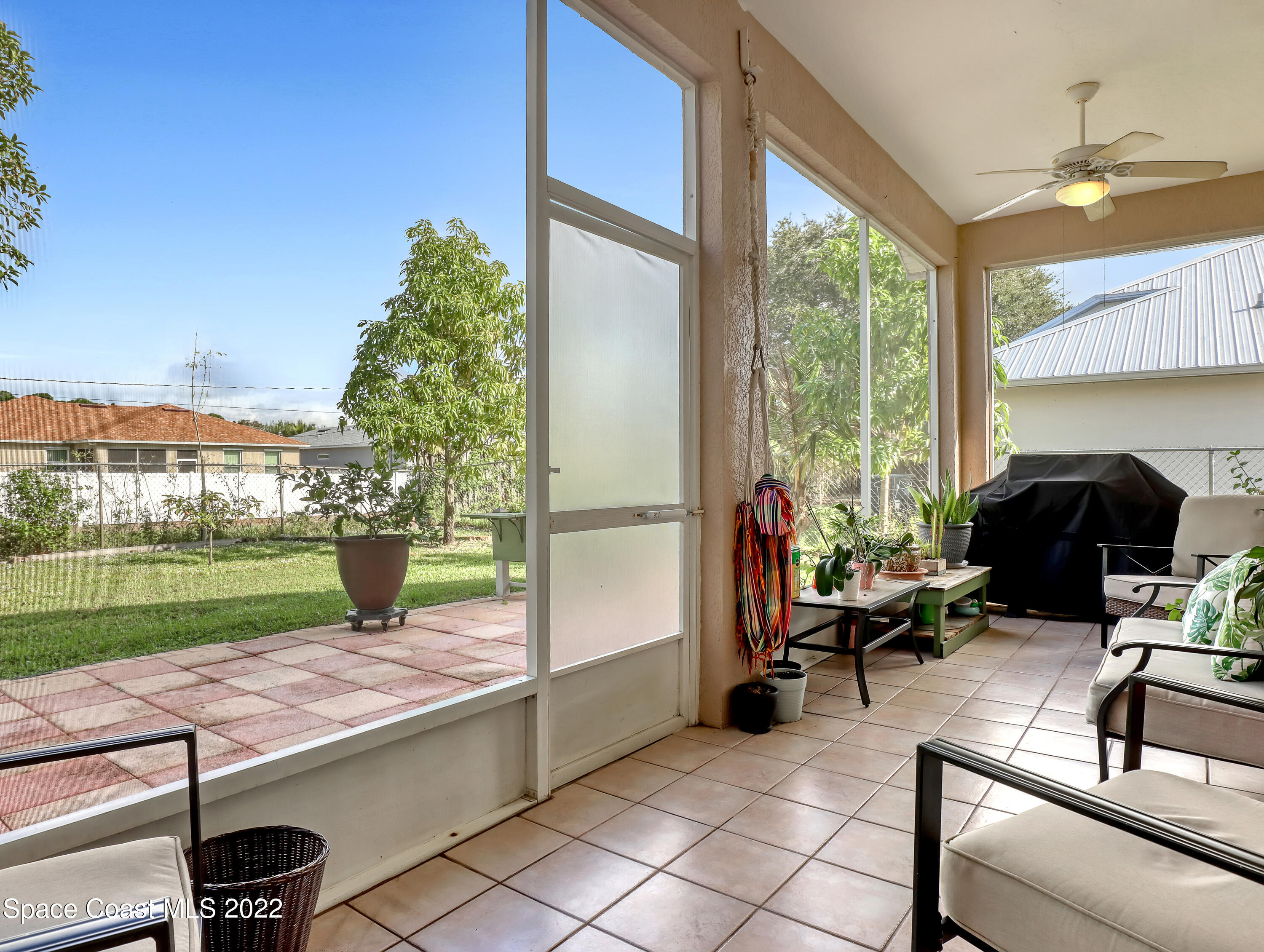 755 Raleigh Road Southeast Palm Bay, FL 32909 - Photo 30 of 36 a living room with furniture