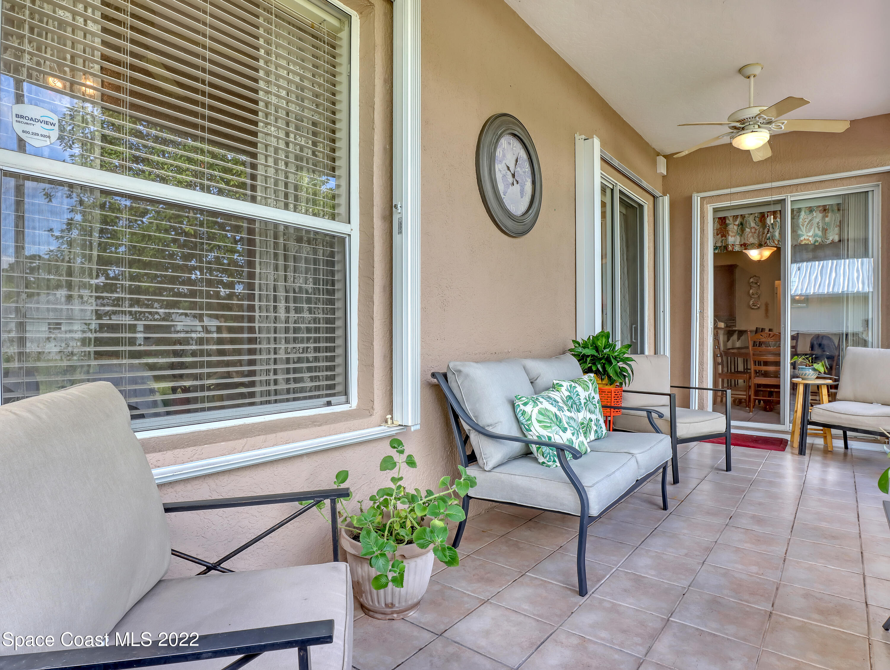 755 Raleigh Road Southeast Palm Bay, FL 32909 - Photo 31 of 36 a view of a house with patio outdoor seating