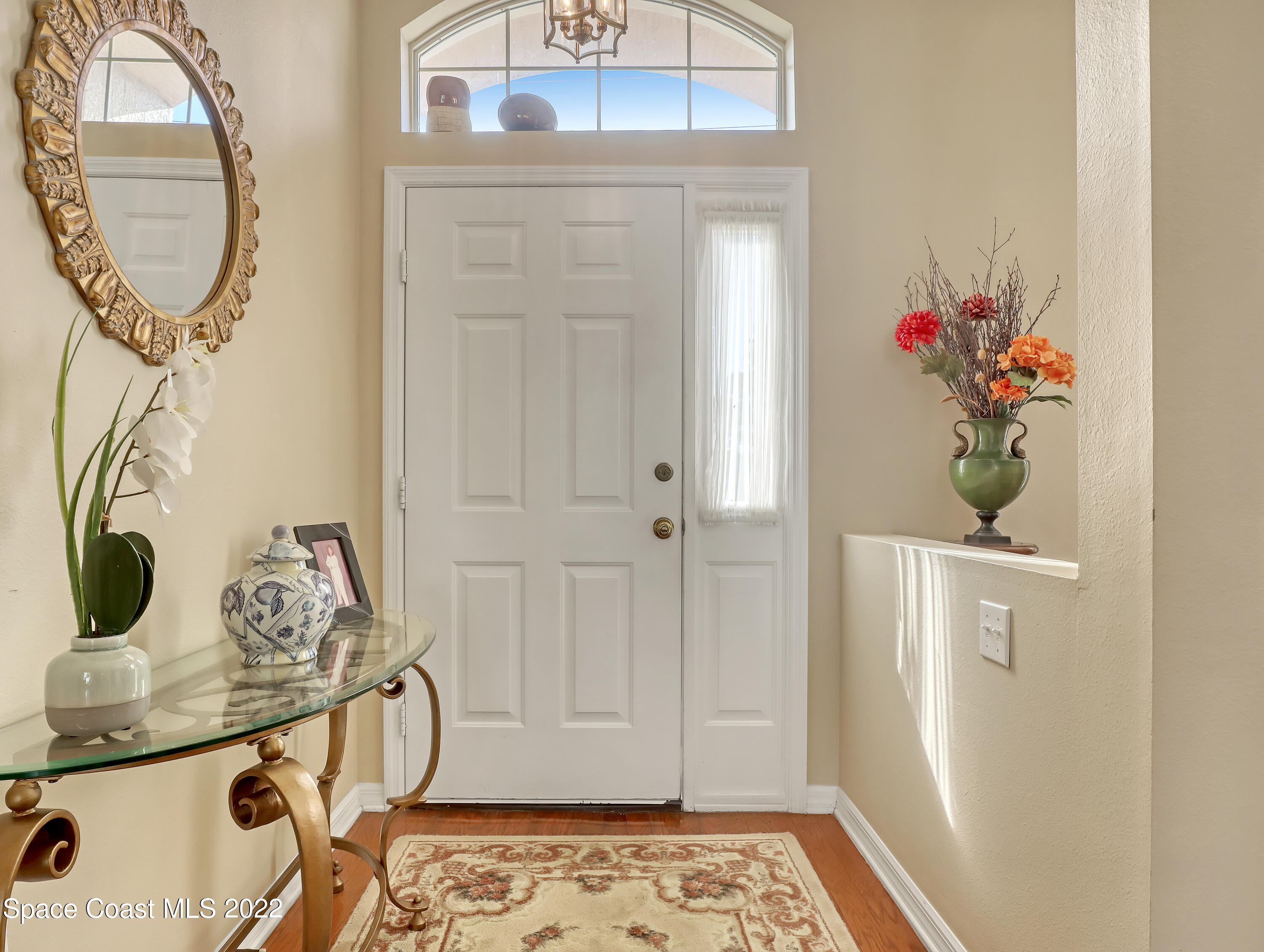 755 Raleigh Road Southeast Palm Bay, FL 32909 - Photo 4 of 36 a view of a hallway with painted walls
