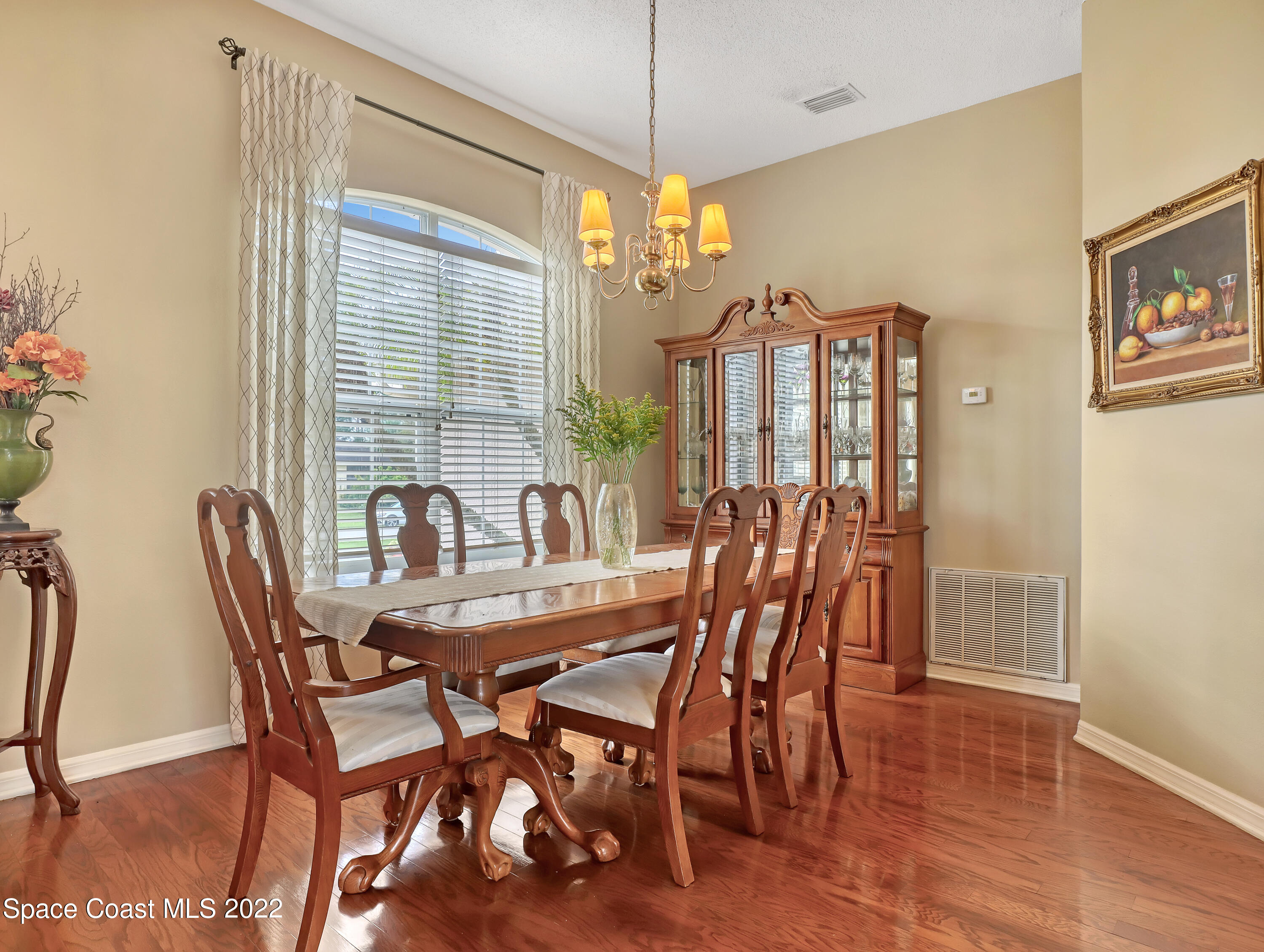 755 Raleigh Road Southeast Palm Bay, FL 32909 - Photo 9 of 36 a dining room with furniture and window