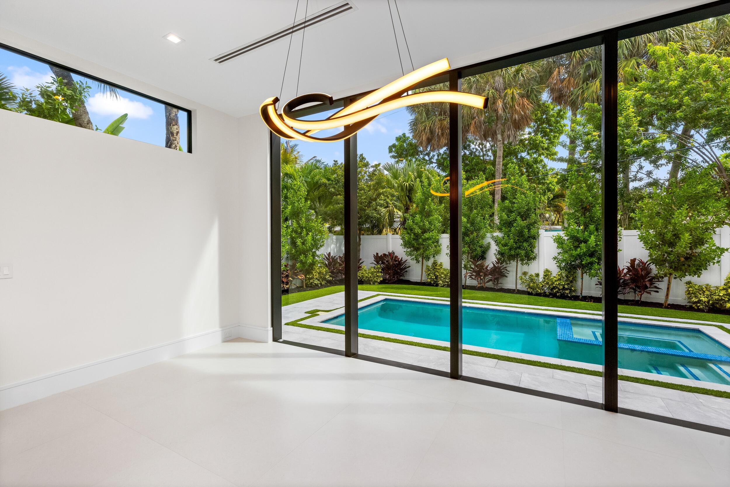 753 Park Drive West Boca Raton, FL 33432 - Photo 13 of 50 a view of empty room with floor to ceiling window