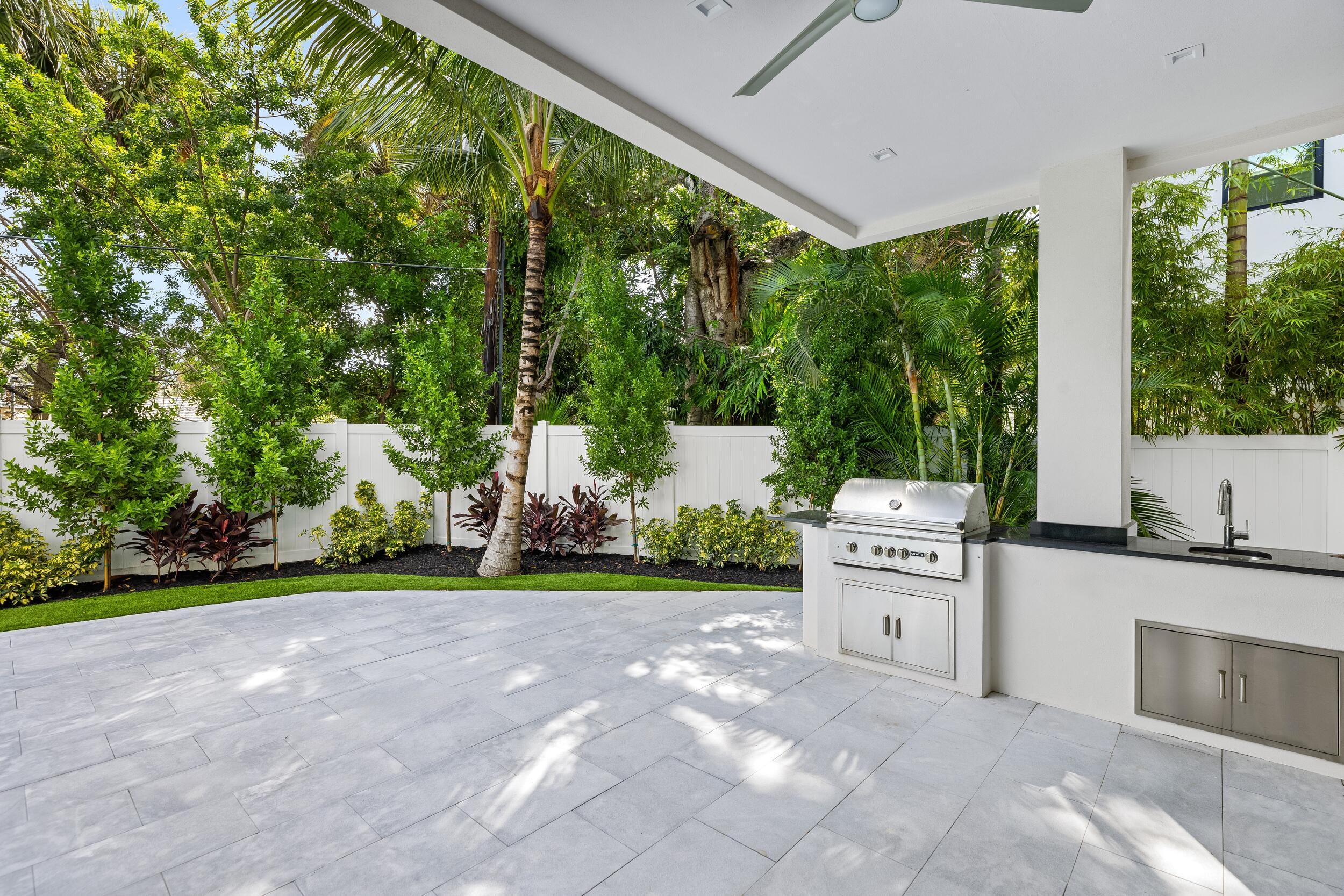 753 Park Drive West Boca Raton, FL 33432 - Photo 15 of 50 a view of a backyard with plants and garden
