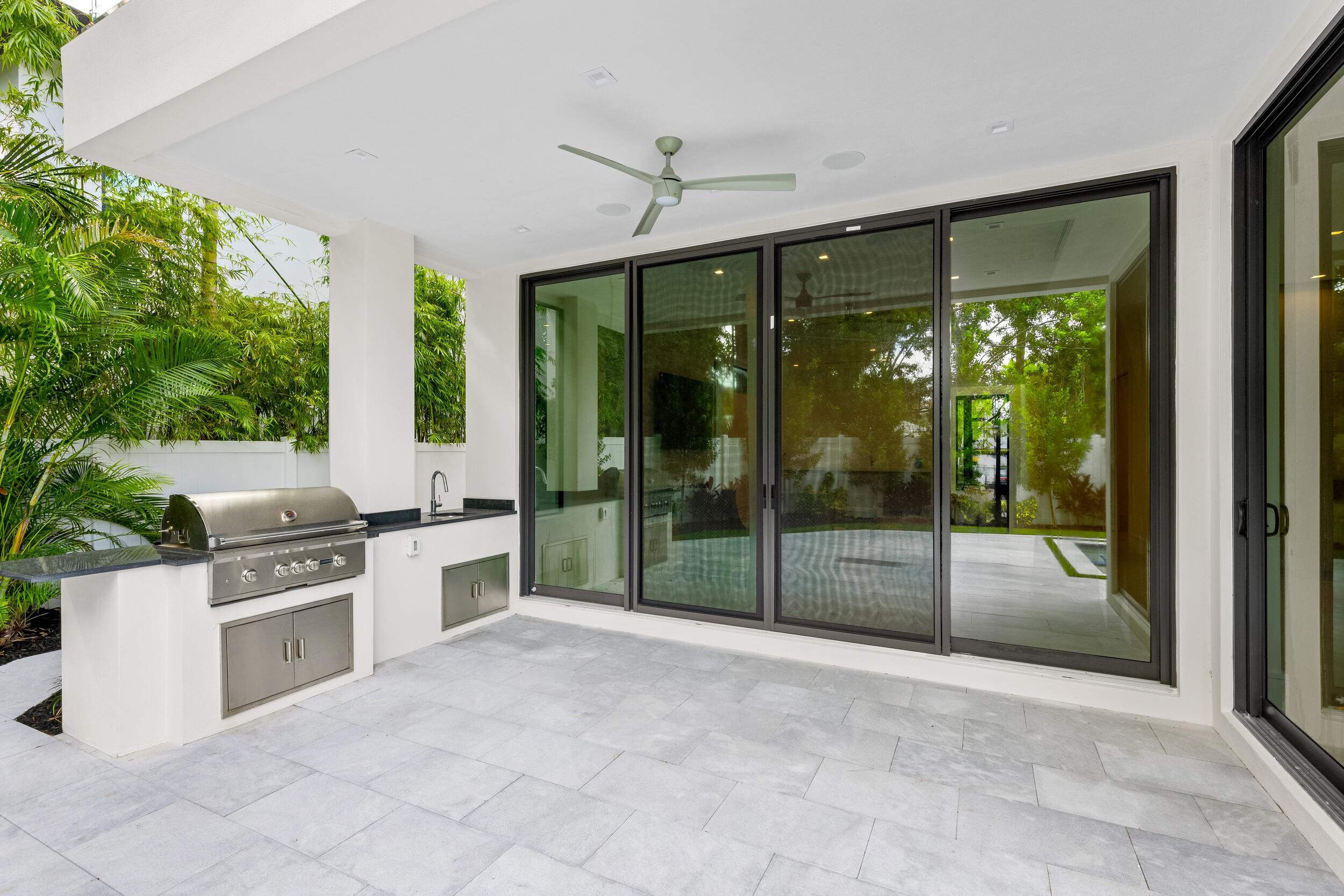 753 Park Drive West Boca Raton, FL 33432 - Photo 20 of 50 a view of a kitchen with an outdoor space and balcony