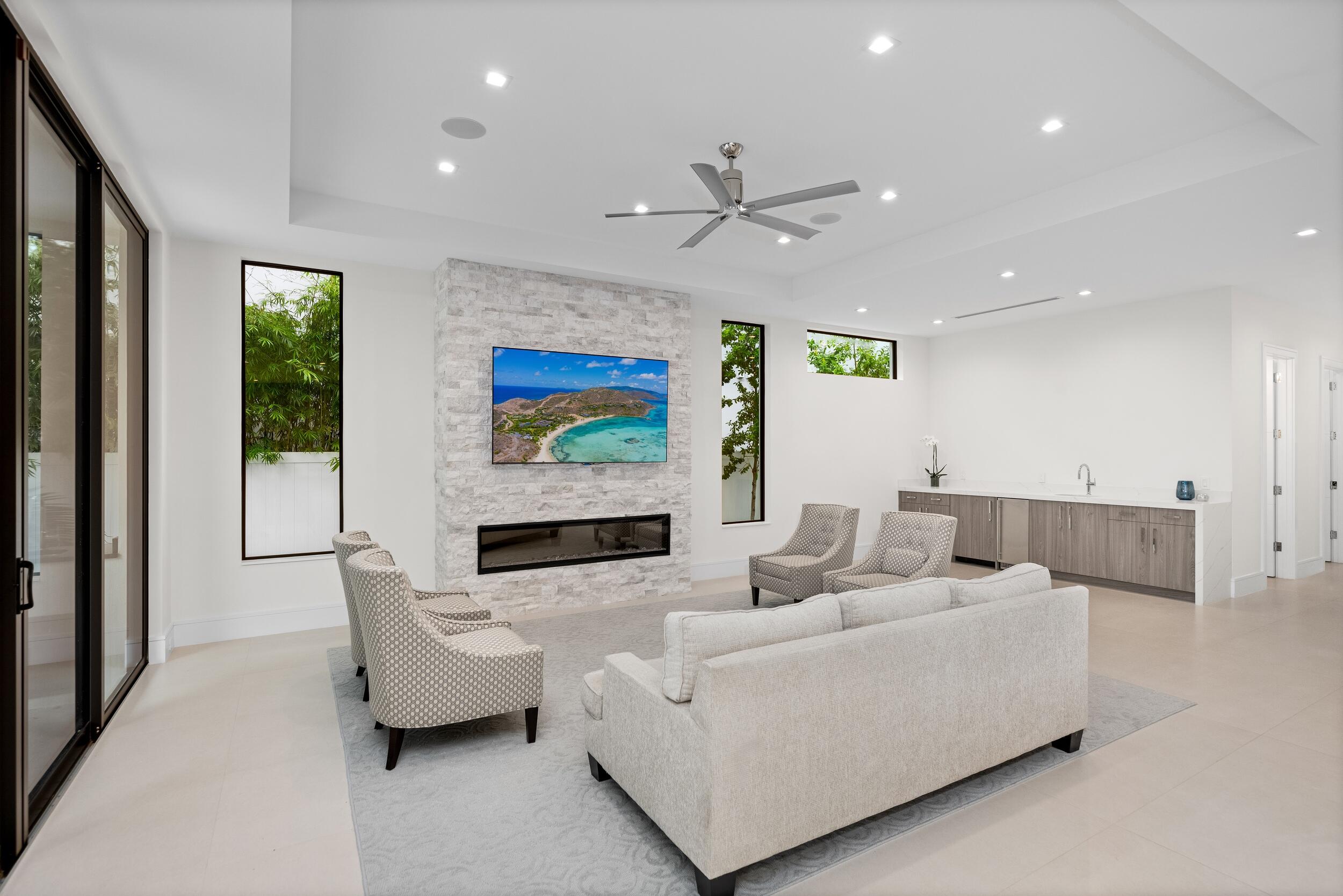753 Park Drive West Boca Raton, FL 33432 - Photo 21 of 50 a living room with furniture and a flat screen tv