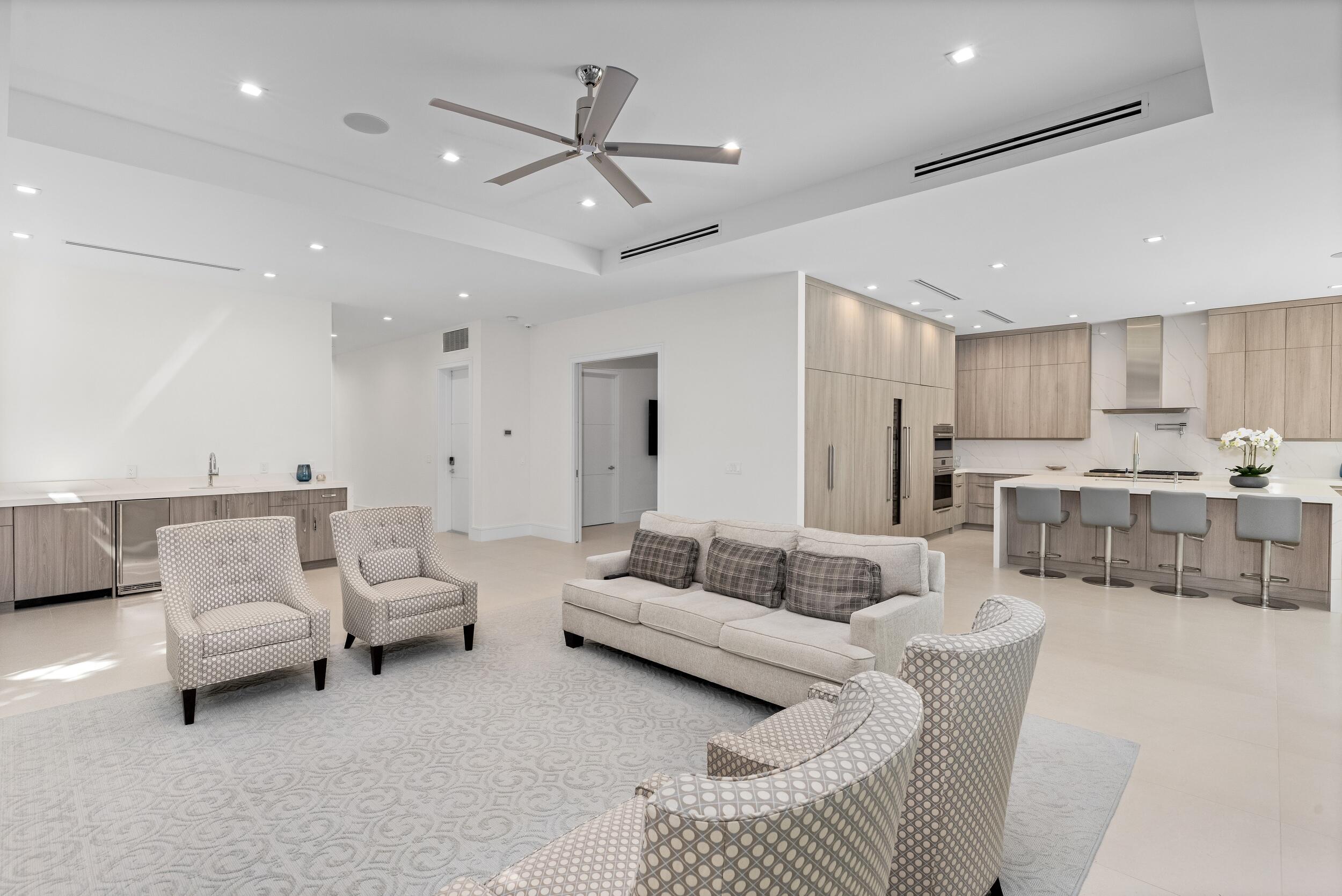 753 Park Drive West Boca Raton, FL 33432 - Photo 24 of 50 a living room with furniture and a view of kitchen