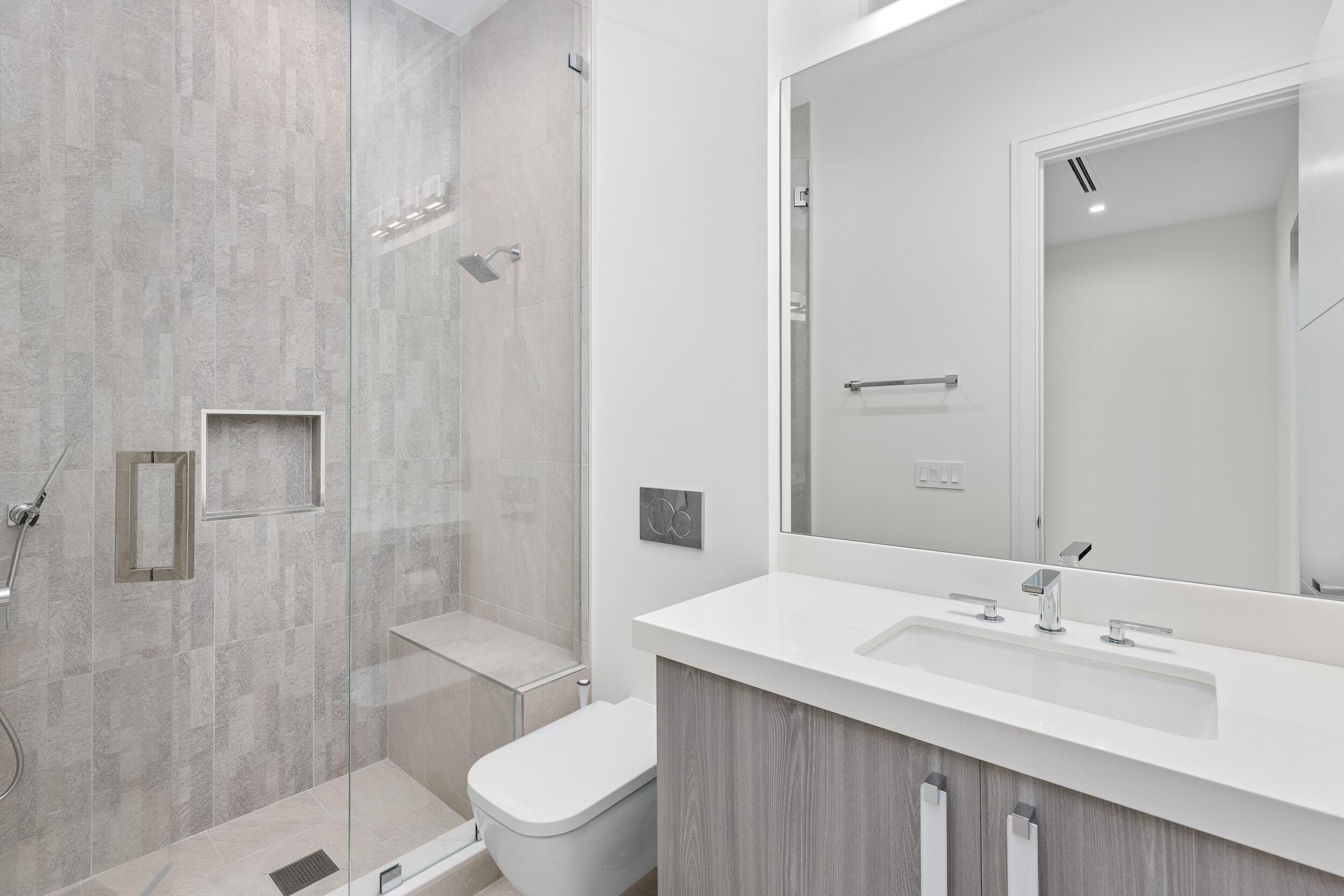 753 Park Drive West Boca Raton, FL 33432 - Photo 28 of 50 a bathroom with a sink toilet and shower