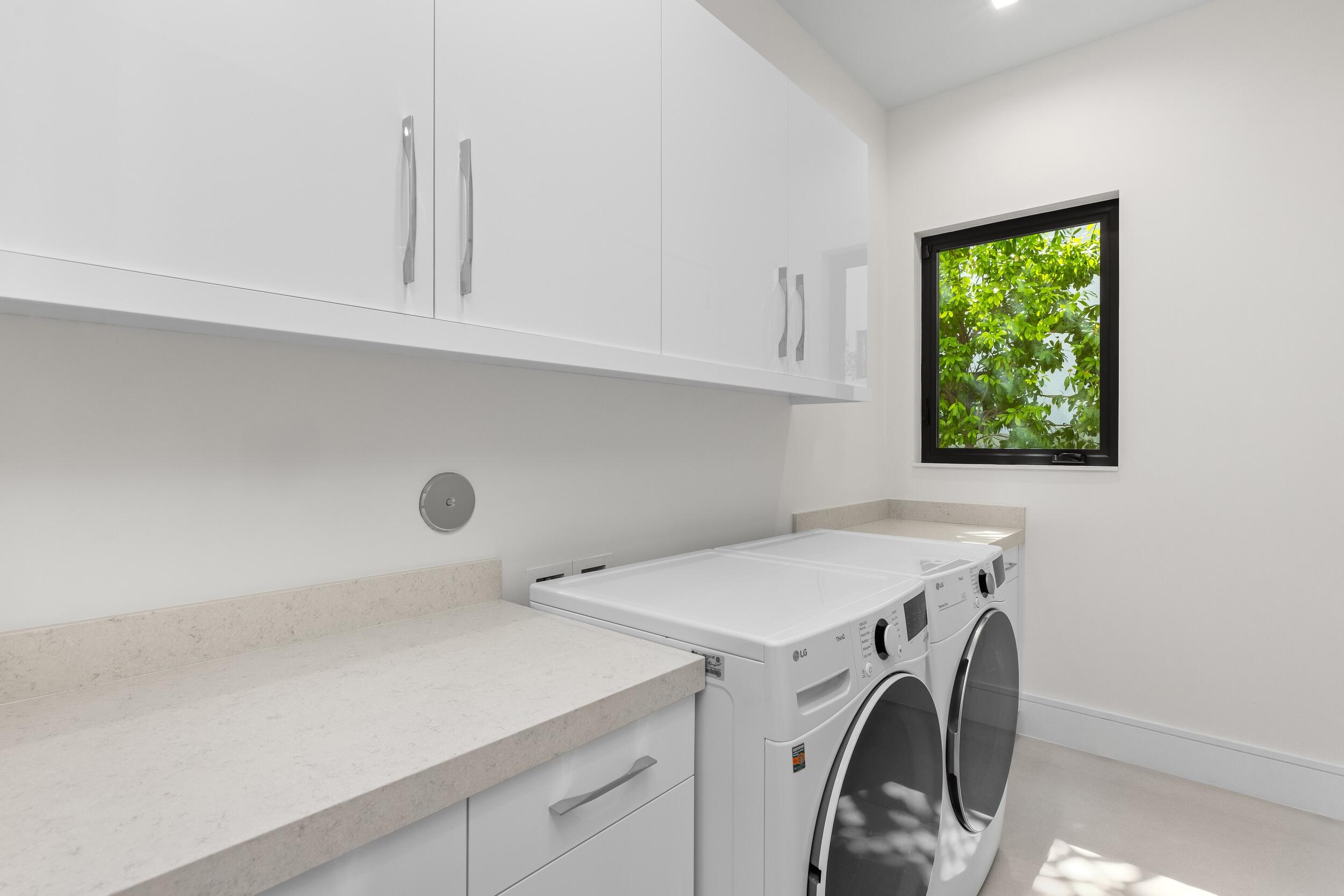 753 Park Drive West Boca Raton, FL 33432 - Photo 31 of 50 a utility room with dryer and washer