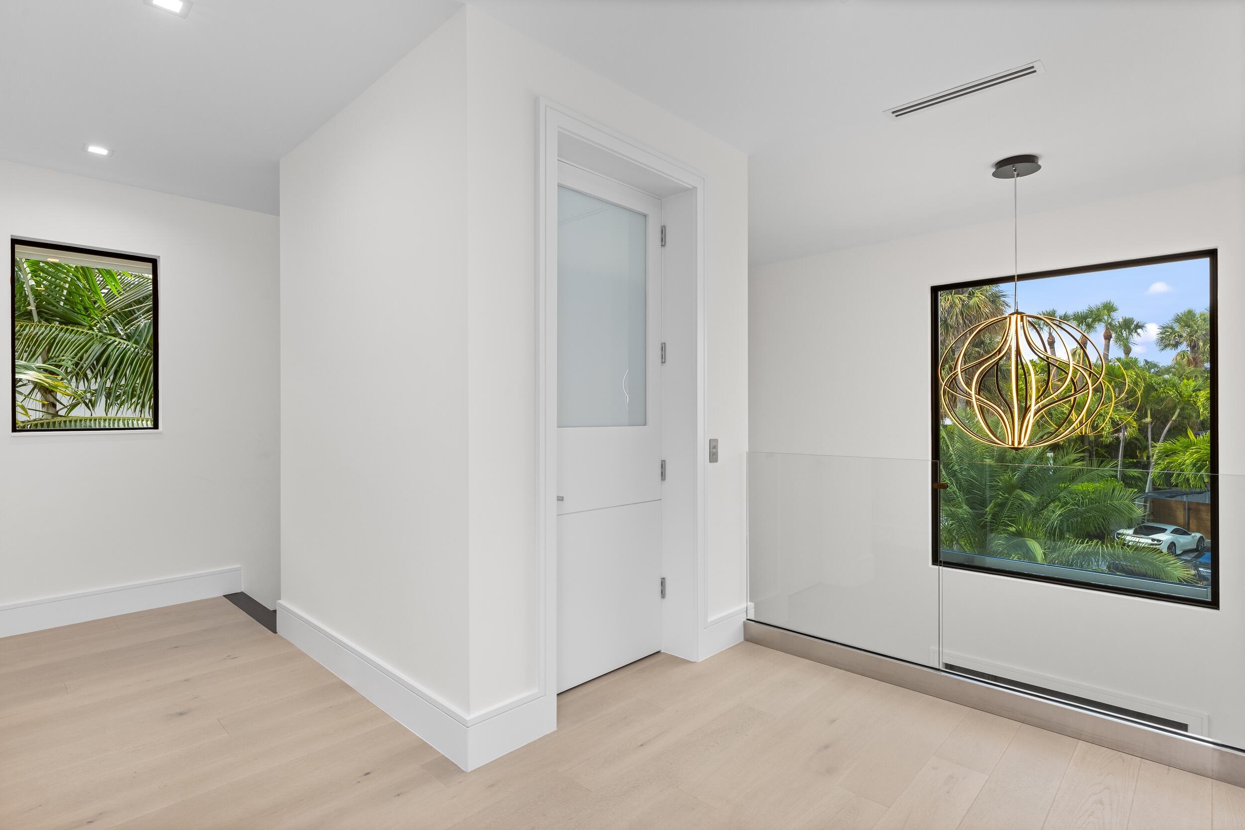 753 Park Drive West Boca Raton, FL 33432 - Photo 32 of 50 an empty room with window