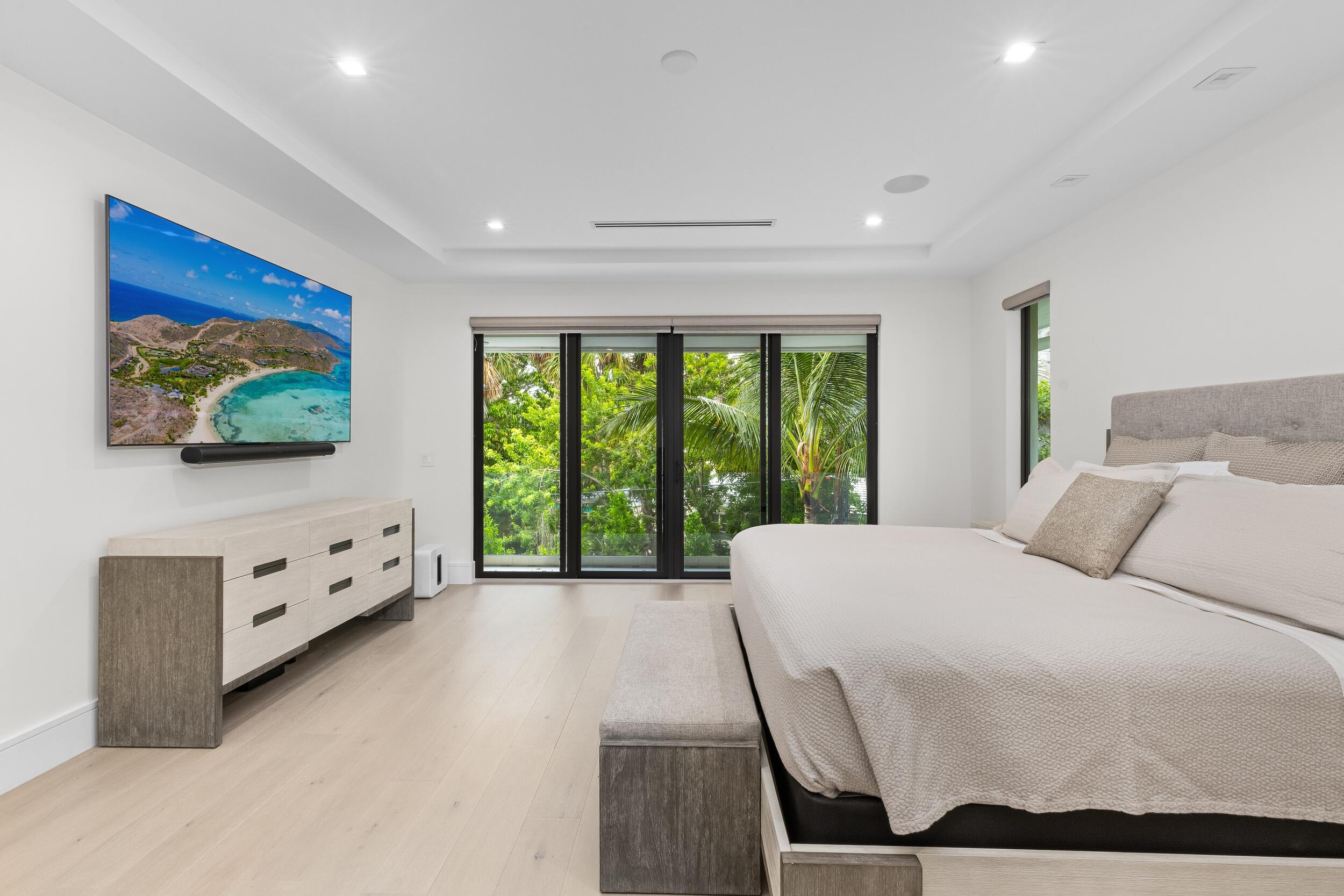 753 Park Drive West Boca Raton, FL 33432 - Photo 35 of 50 a large white bed sitting in a room next to a window