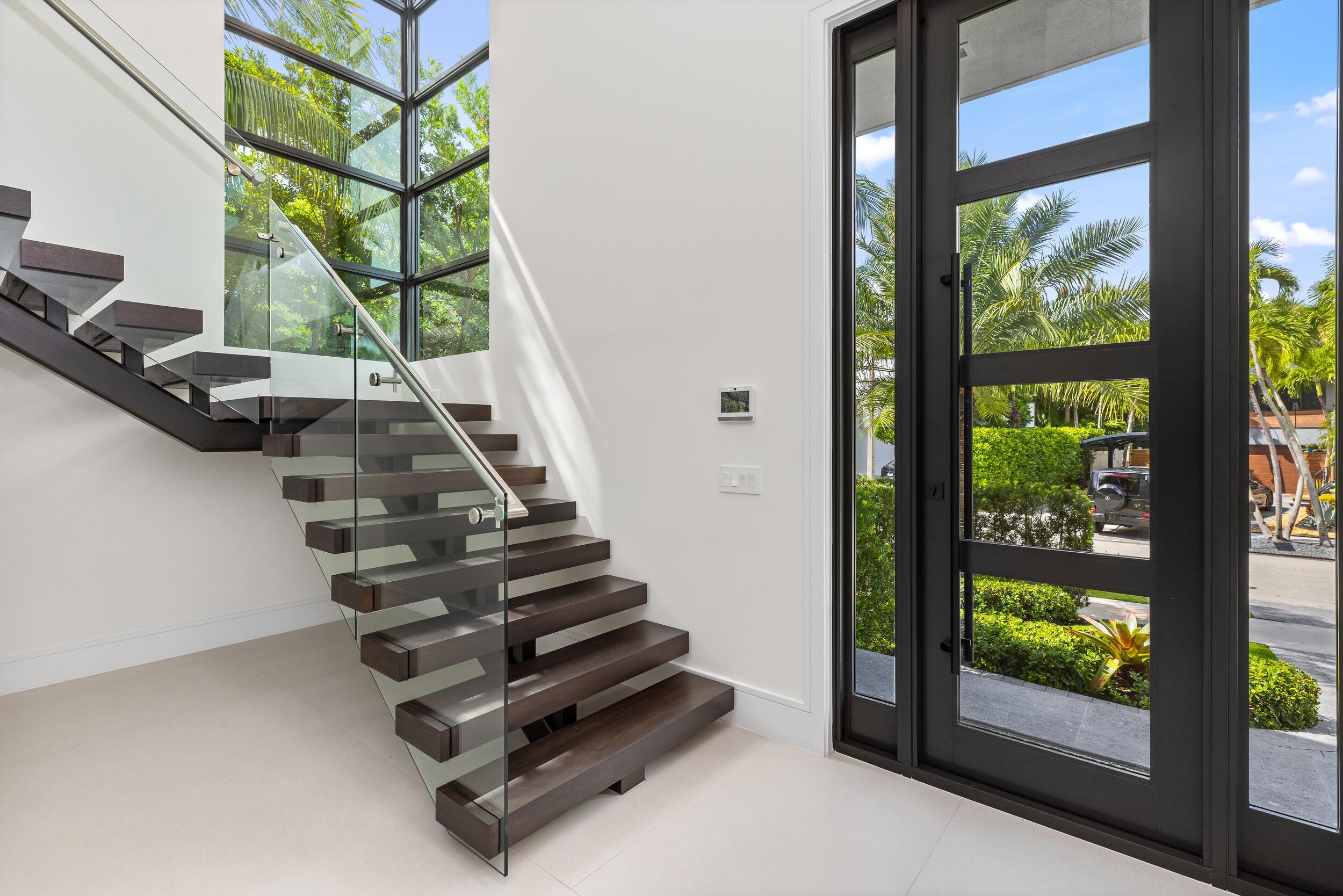 753 Park Drive West Boca Raton, FL 33432 - Photo 4 of 50 a view of entryway and hall with wooden floor