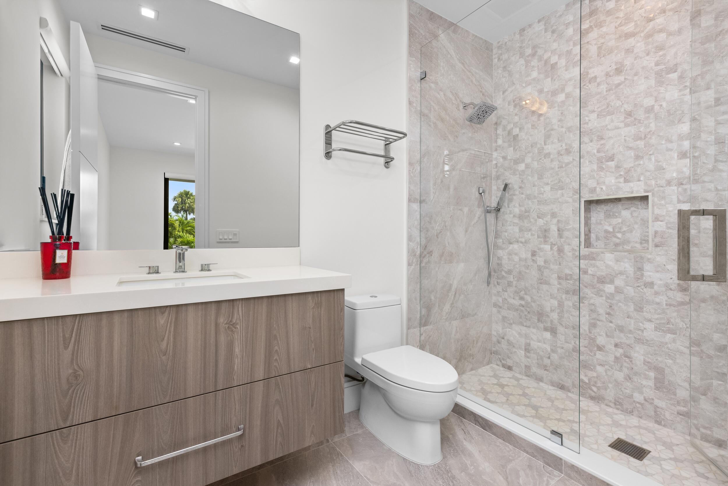 753 Park Drive West Boca Raton, FL 33432 - Photo 46 of 50 a bathroom with a sink a toilet and shower