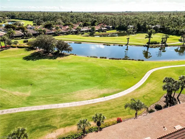 a view of a swimming pool and lake view