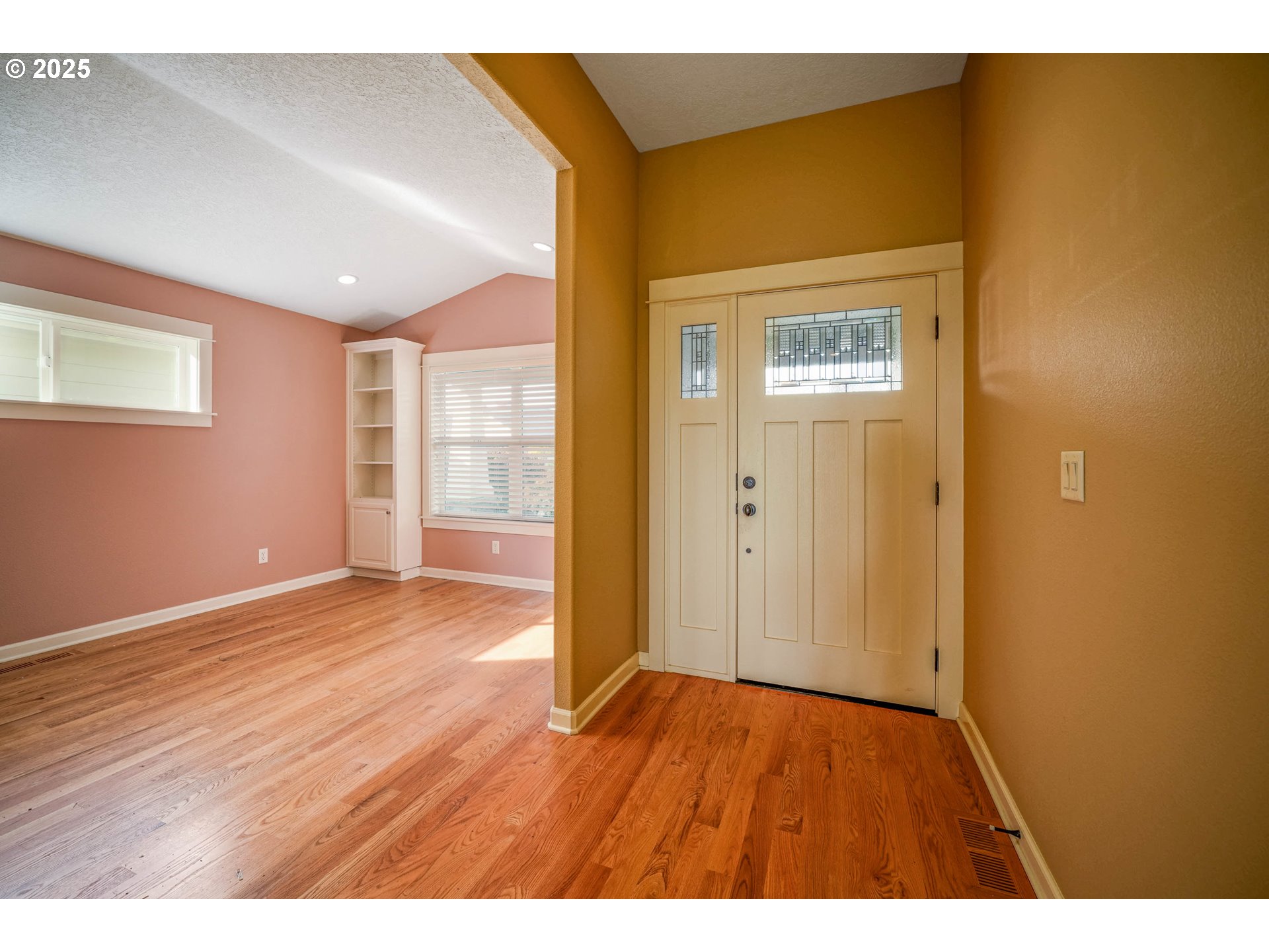 736 Southeast St Andrews Lane Dallas, OR 97338 - Photo 13 of 35 a view of an empty room and wooden floor