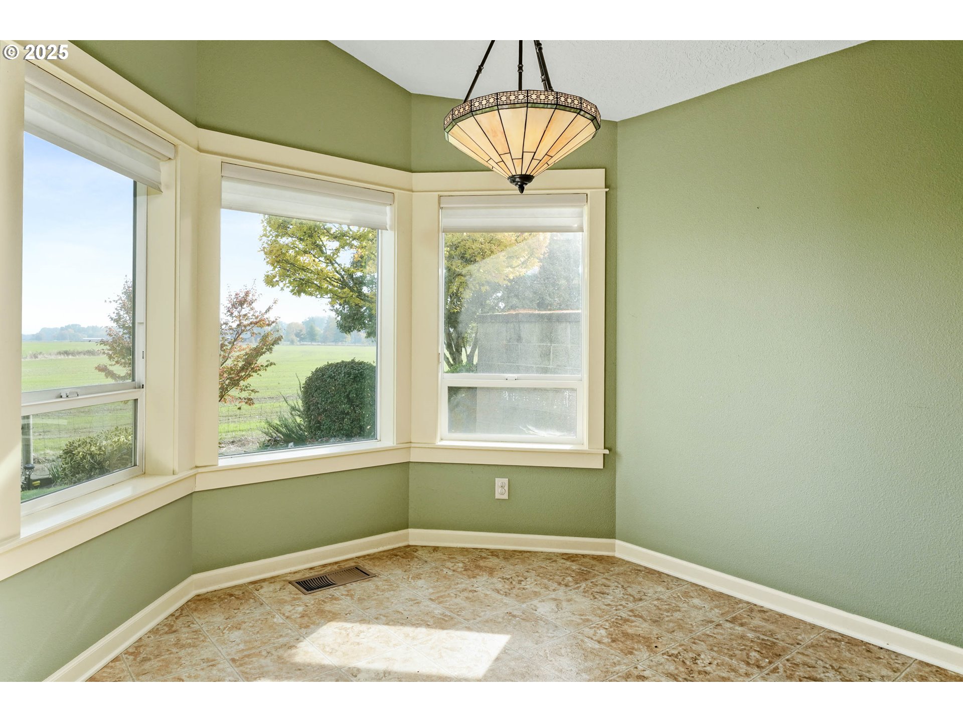 736 Southeast St Andrews Lane Dallas, OR 97338 - Photo 21 of 35 a view of an empty room and window