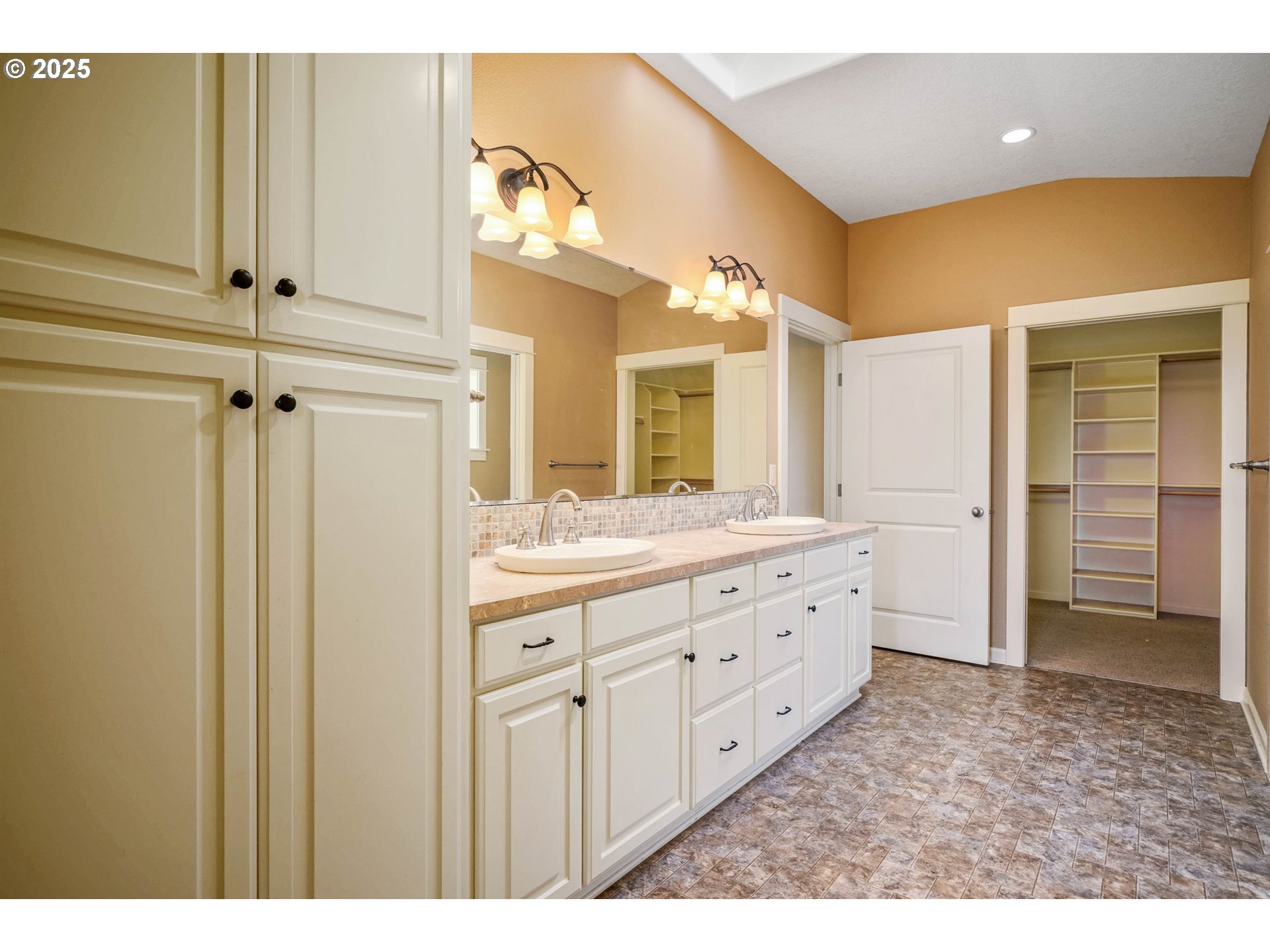 736 Southeast St Andrews Lane Dallas, OR 97338 - Photo 29 of 35 a bathroom with a granite countertop sink mirror and