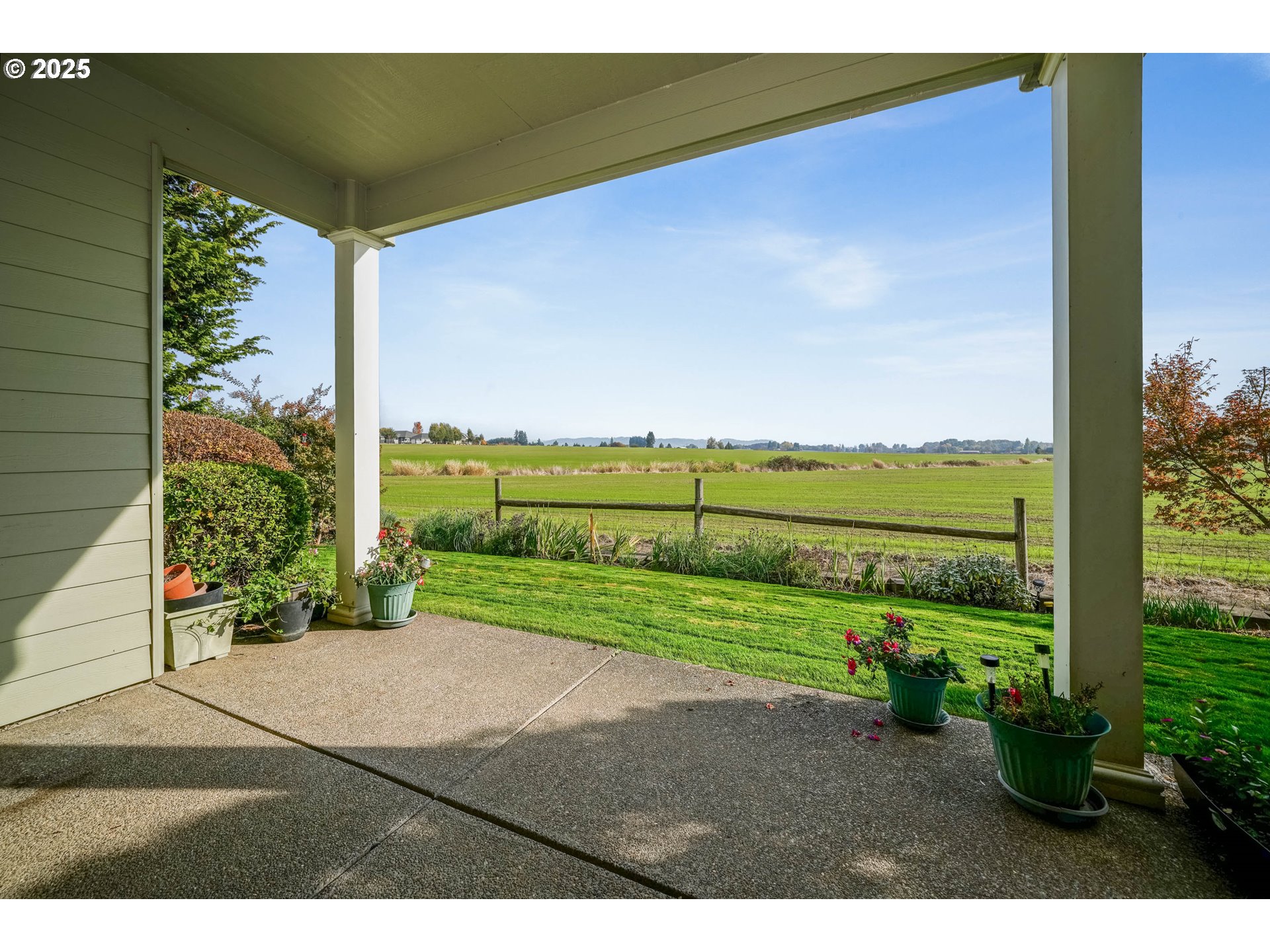 736 Southeast St Andrews Lane Dallas, OR 97338 - Photo 32 of 35 a view of a road with a yard