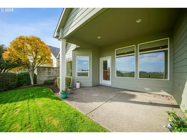a view of a backyard of the house