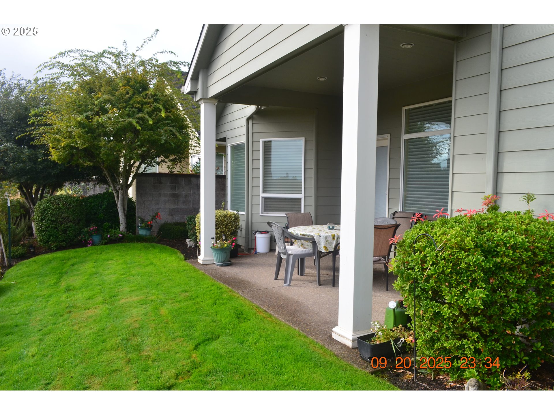 736 Southeast St Andrews Lane Dallas, OR 97338 - Photo 9 of 35 a view of a chair and table in backyard of the house