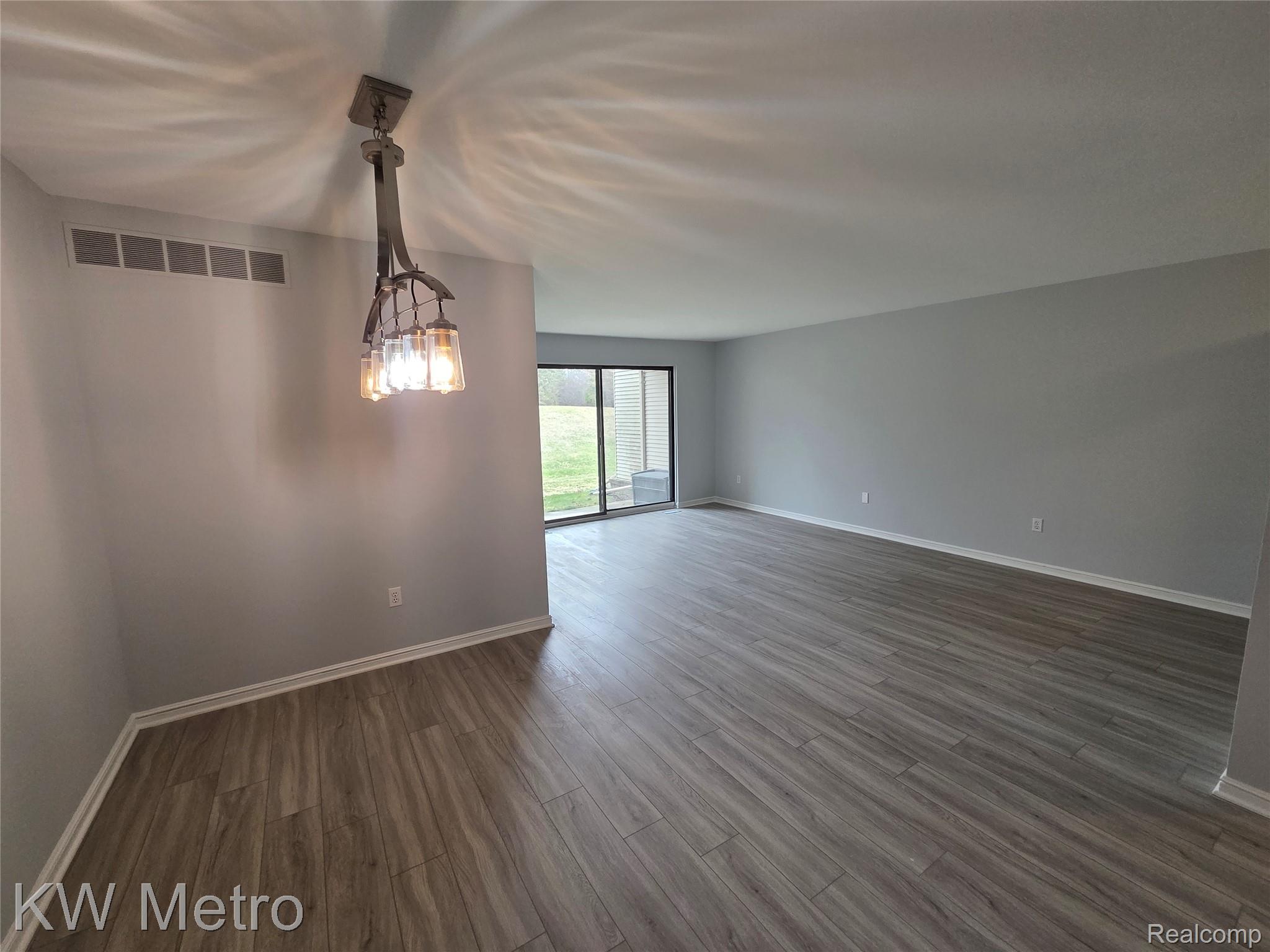 6680 Ridgefield Circle, Unit 104 West Bloomfield, MI 48322 - Photo 5 of 20 LIVING ROOM VIEW THREE
