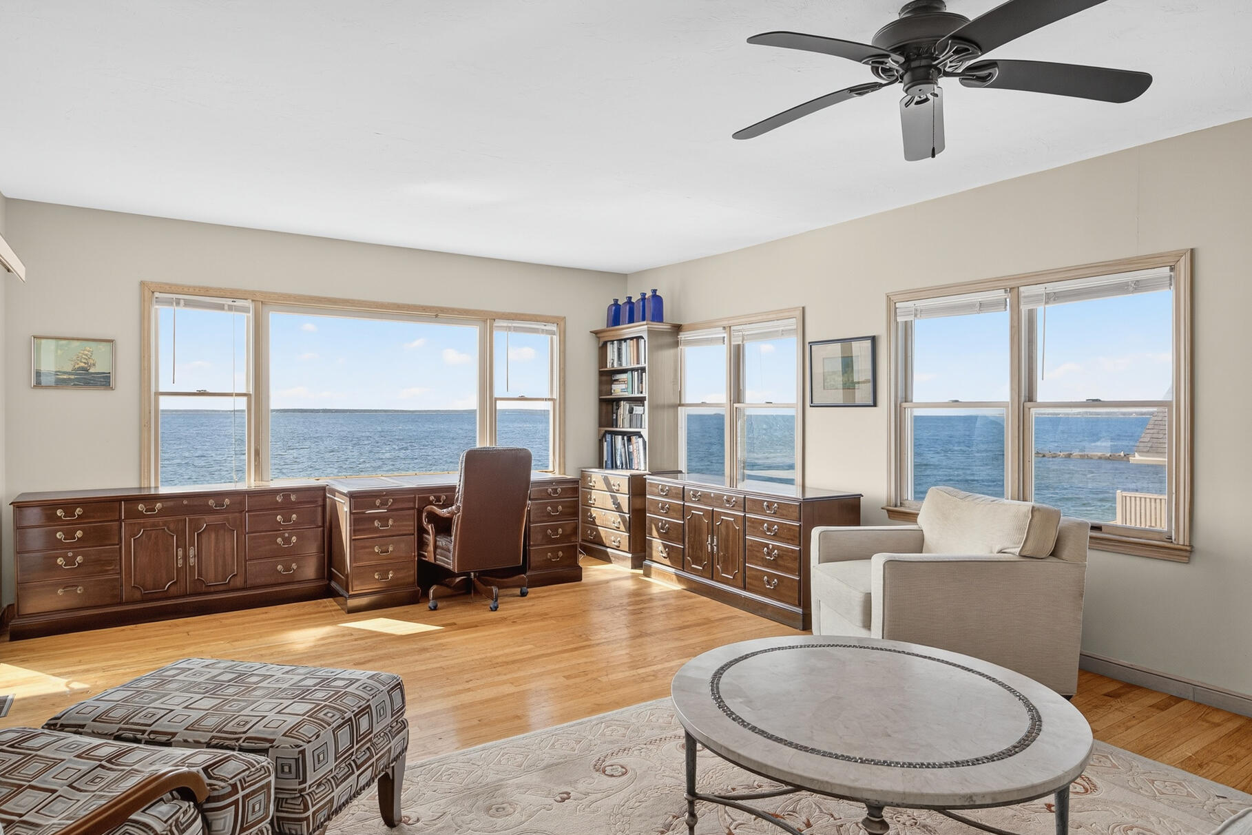 61 Menauhant Road East Falmouth, MA 02536 - Photo 22 of 65 a living room with furniture and a flat screen tv