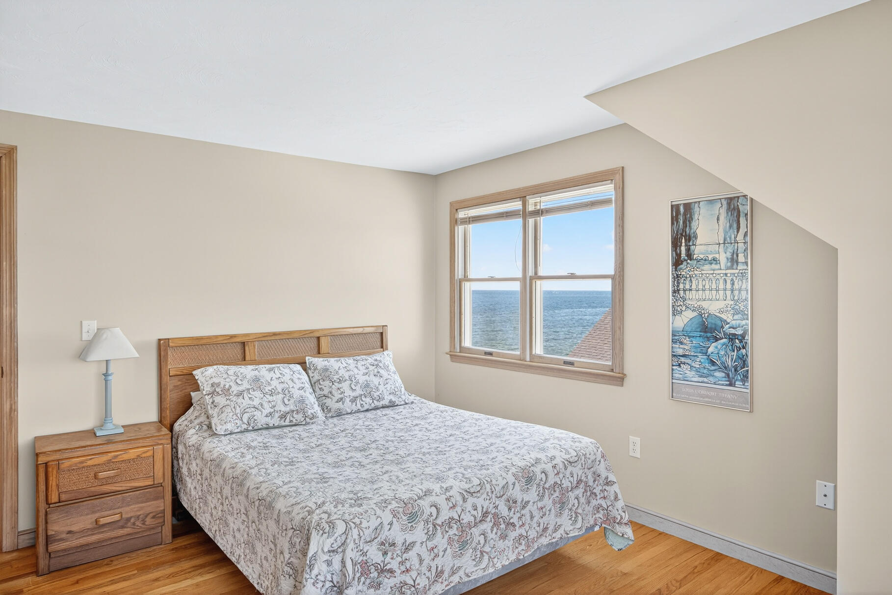 61 Menauhant Road East Falmouth, MA 02536 - Photo 30 of 65 a bedroom with a bed and a window