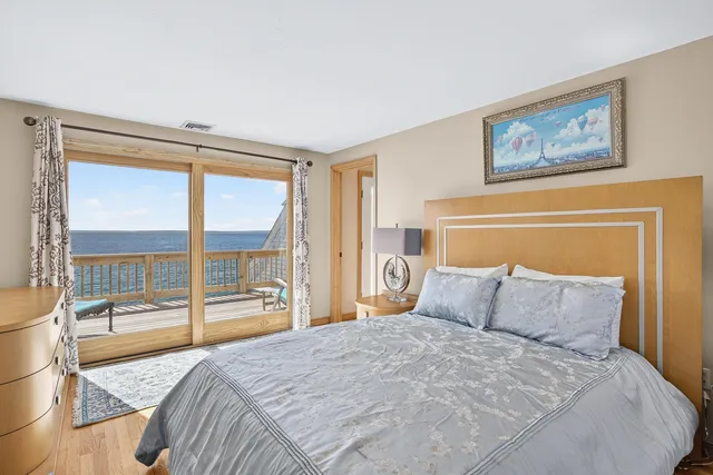 a view of a roof deck with a patio