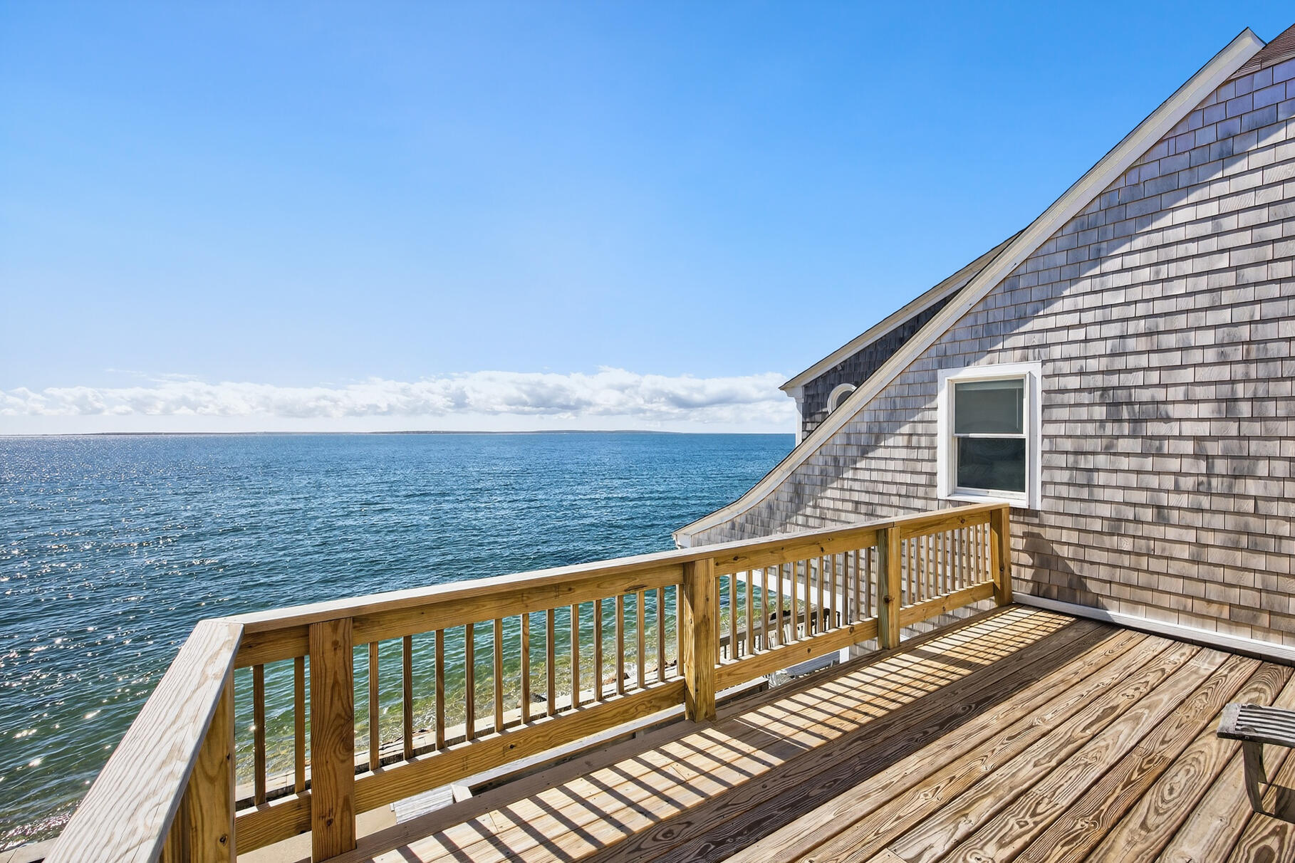 61 Menauhant Road East Falmouth, MA 02536 - Photo 41 of 65 a view of balcony with wooden floor and fence