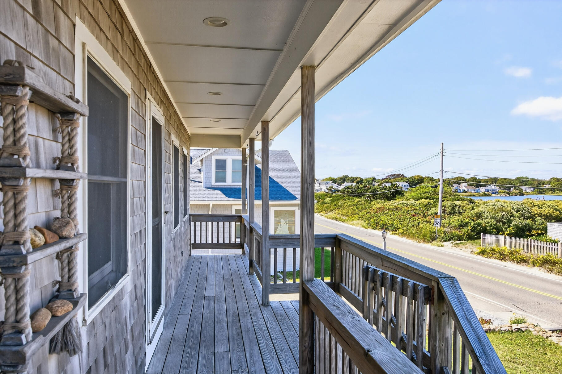 61 Menauhant Road East Falmouth, MA 02536 - Photo 52 of 65 a view of a balcony with wooden floor