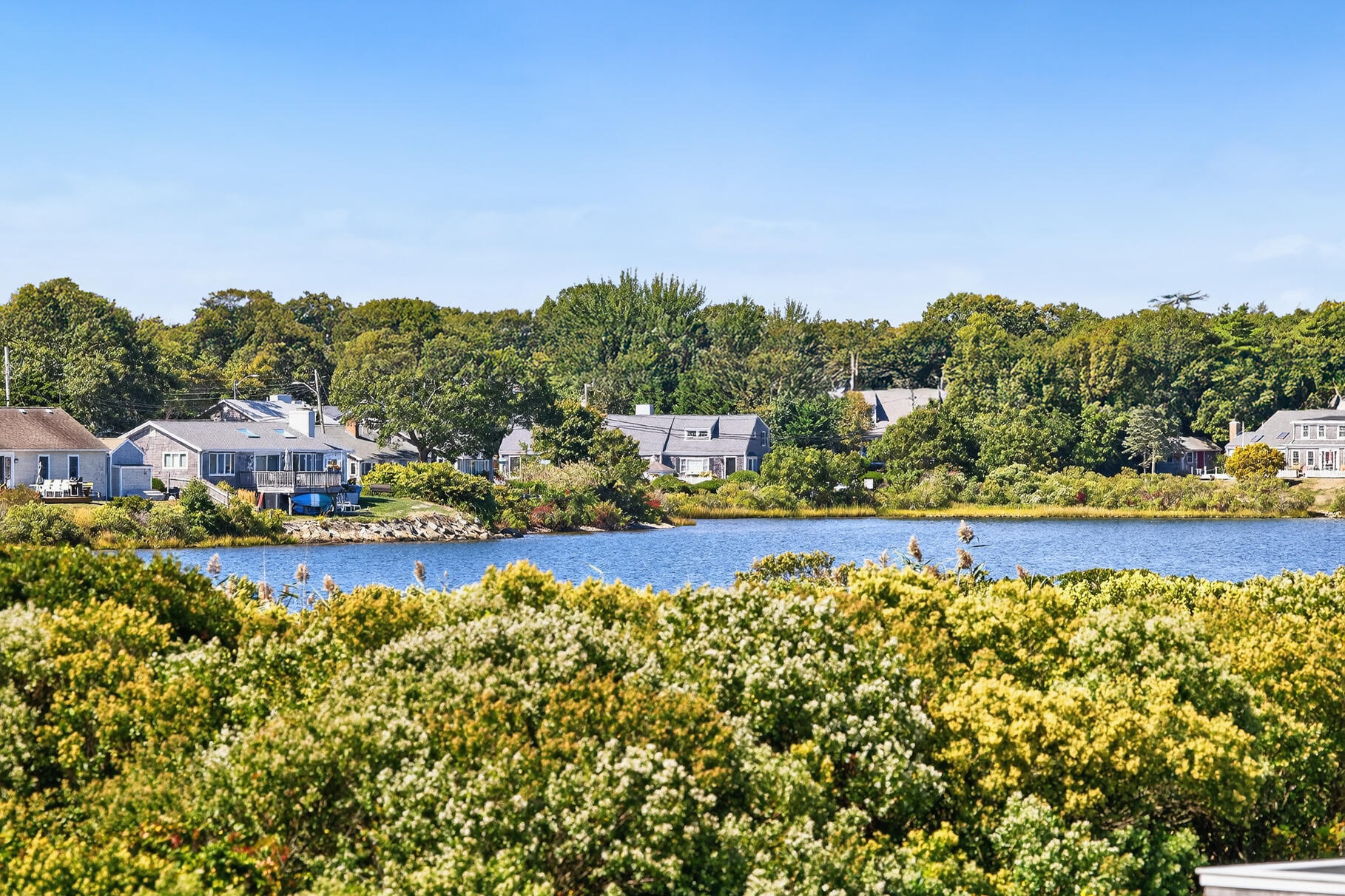 61 Menauhant Road East Falmouth, MA 02536 - Photo 53 of 65 a view of a swimming pool with an outdoor seating
