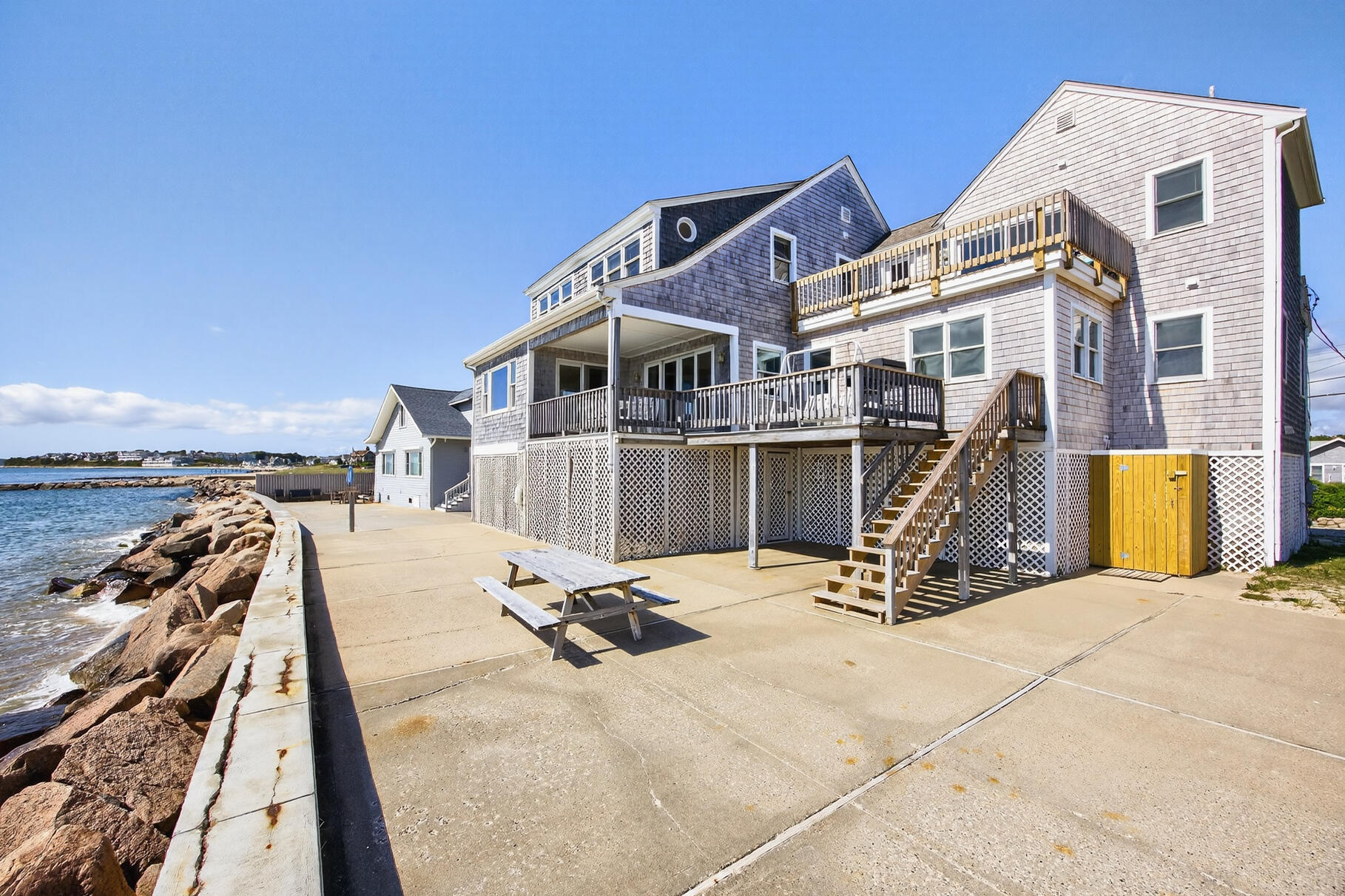 61 Menauhant Road East Falmouth, MA 02536 - Photo 55 of 65 a view of a house with wooden fence