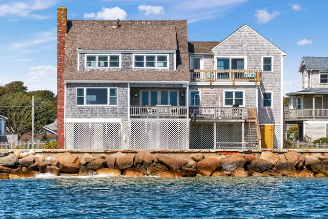 an aerial view of a house with swimming pool