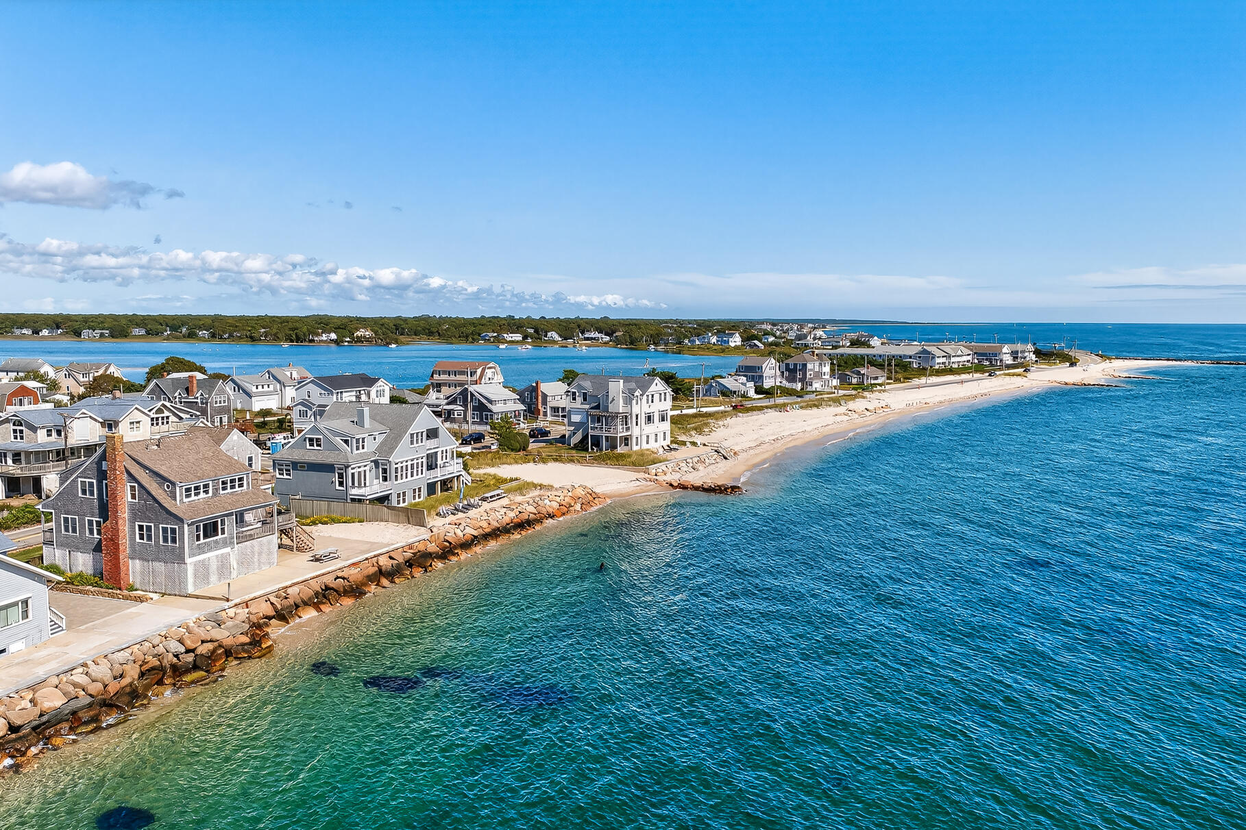 61 Menauhant Road East Falmouth, MA 02536 - Photo 10 of 65 a view of a swimming pool with an ocean view