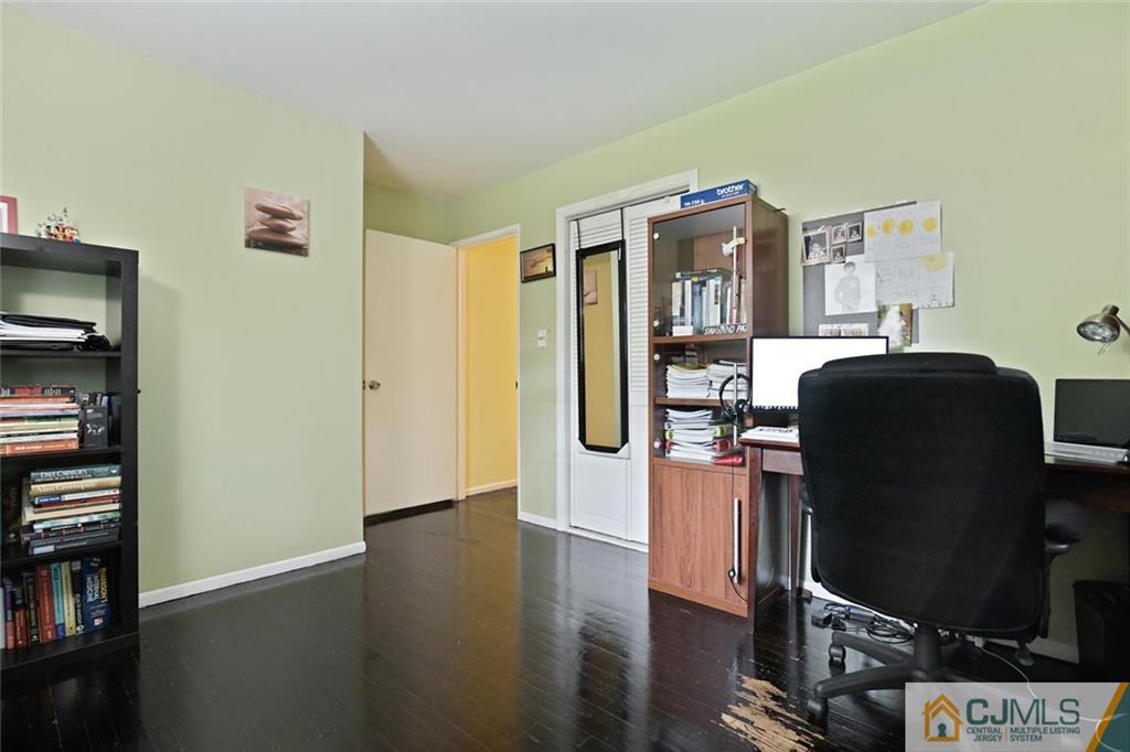 18 Tamarack Road Edison, NJ 08820 - Photo 15 of 25 a workspace with furniture and wooden floor