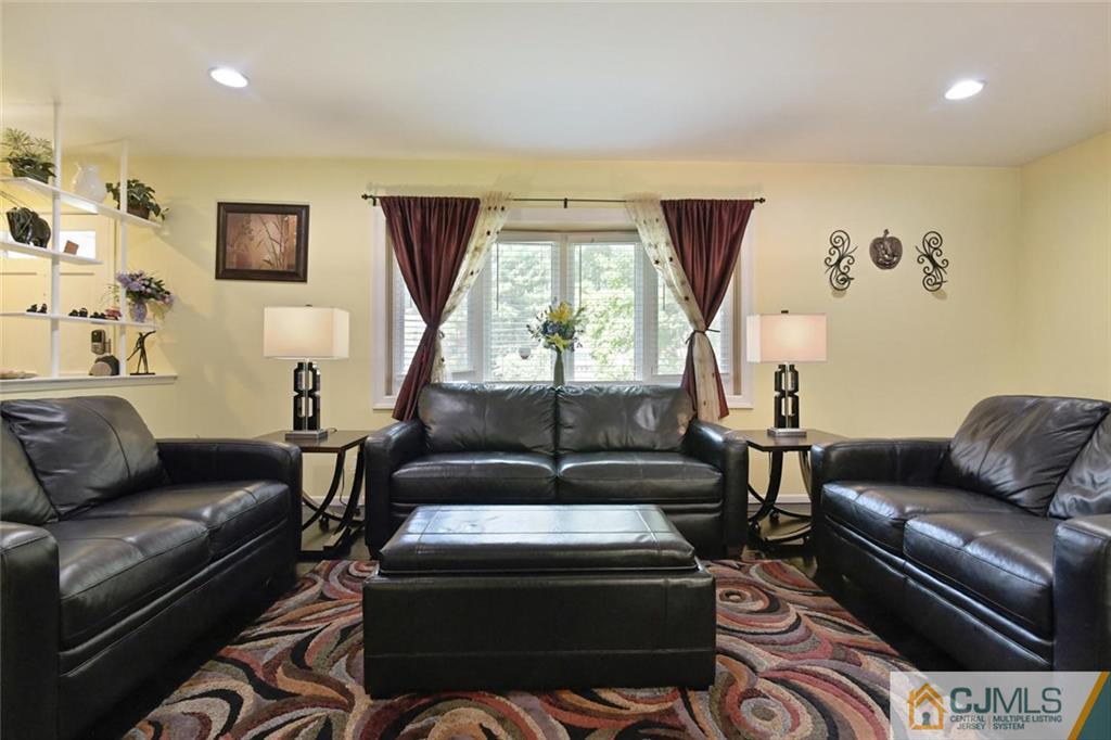 18 Tamarack Road Edison, NJ 08820 - Photo 3 of 25 a living room with furniture and a window