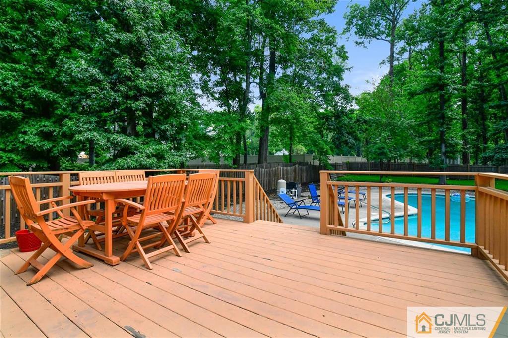 18 Tamarack Road Edison, NJ 08820 - Photo 23 of 25 an outdoor view of a swimming pool and lounge chair