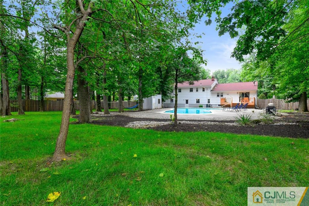 18 Tamarack Road Edison, NJ 08820 - Photo 24 of 25 a view of a house with a yard