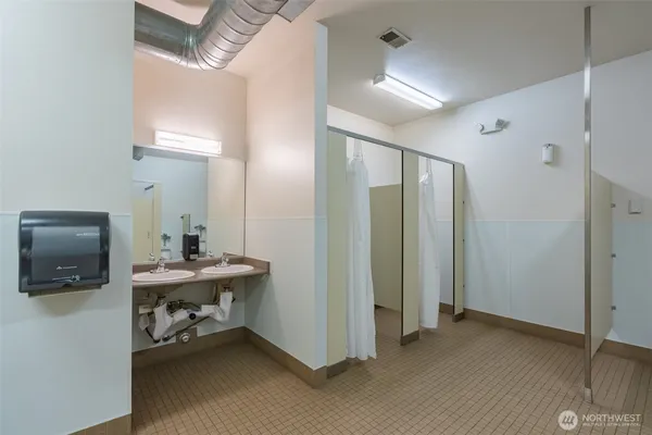 a view of a field with sitting area