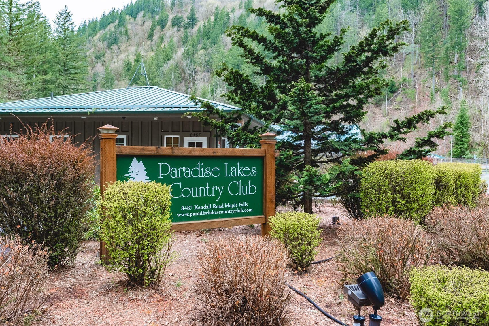 2004 Tower Road Maple Falls, WA 98266 - Photo 31 of 31 a view of a street with potted plants and large trees