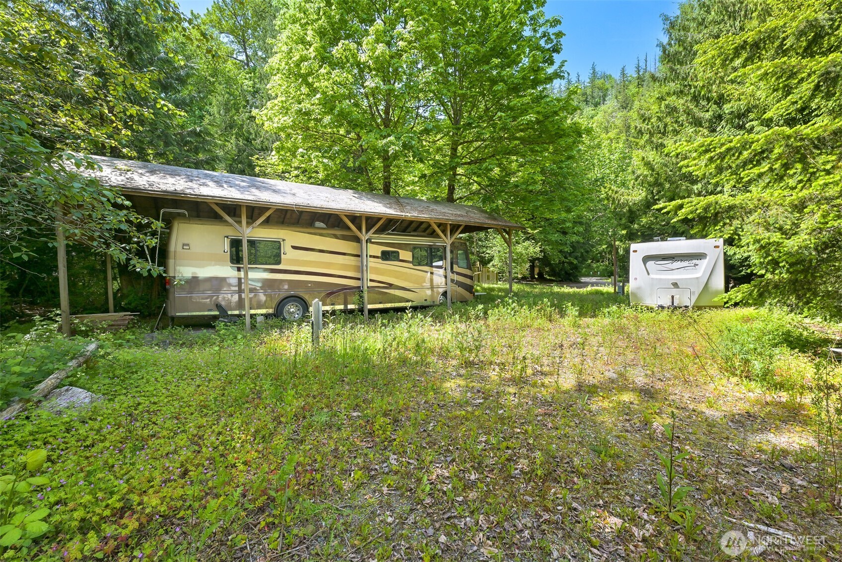 2004 Tower Road Maple Falls, WA 98266 - Photo 5 of 31 a backyard of a house with lots of green space