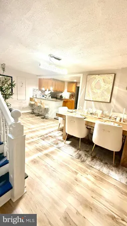 a living room with a patio and a table