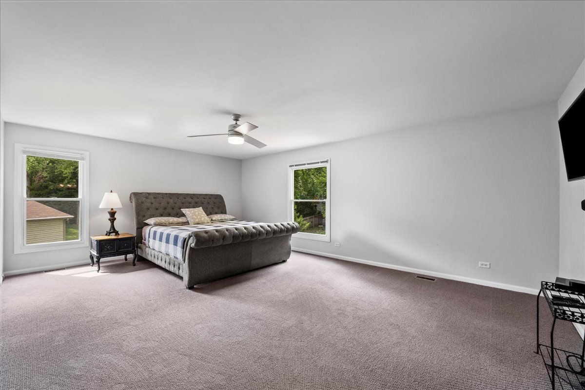 1554 Deer Run Road Gurnee, IL 60031 - Photo 13 of 24 a living room with furniture and a flat screen tv
