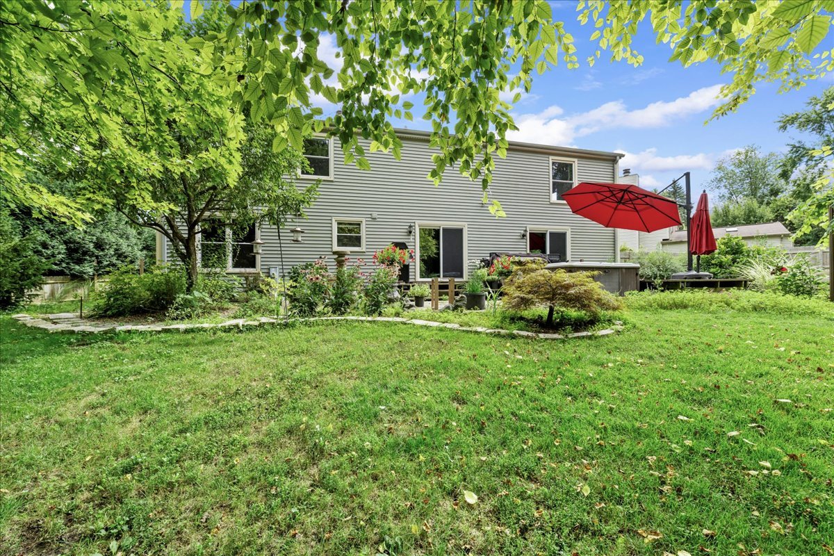 1554 Deer Run Road Gurnee, IL 60031 - Photo 18 of 24 a view of a house with a yard and sitting area