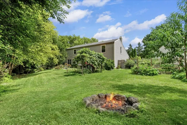 a backyard of a house with lots of green space