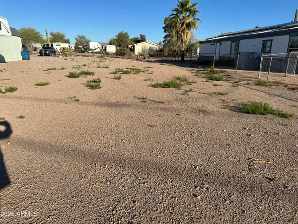 a view of a backyard of a house