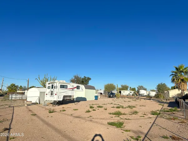 a view of a city street with cars