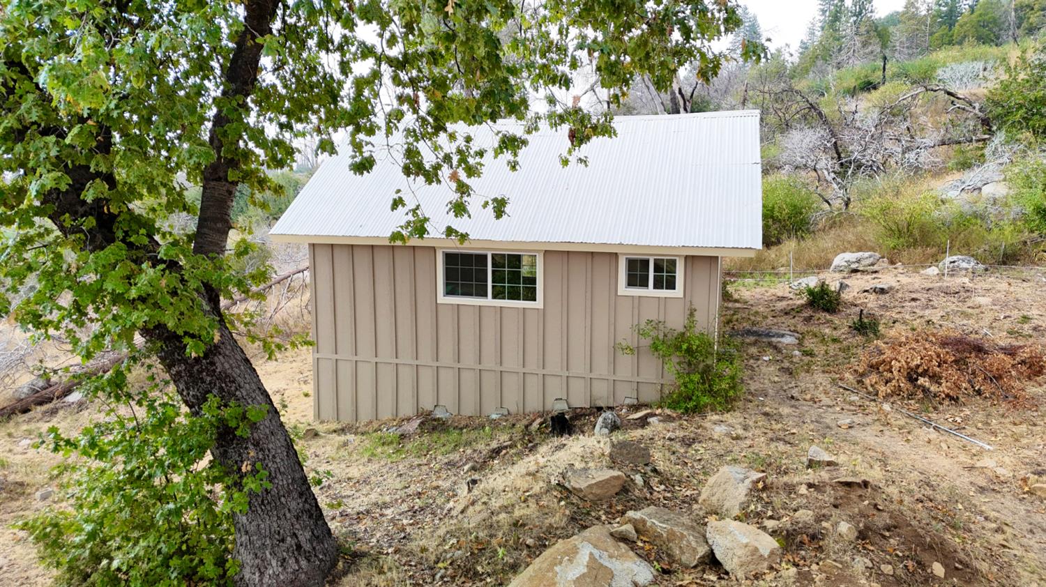 38295 Cressman Road Shaver Lake, CA 93664 - Photo 25 of 31 an aerial view of a house with a yard