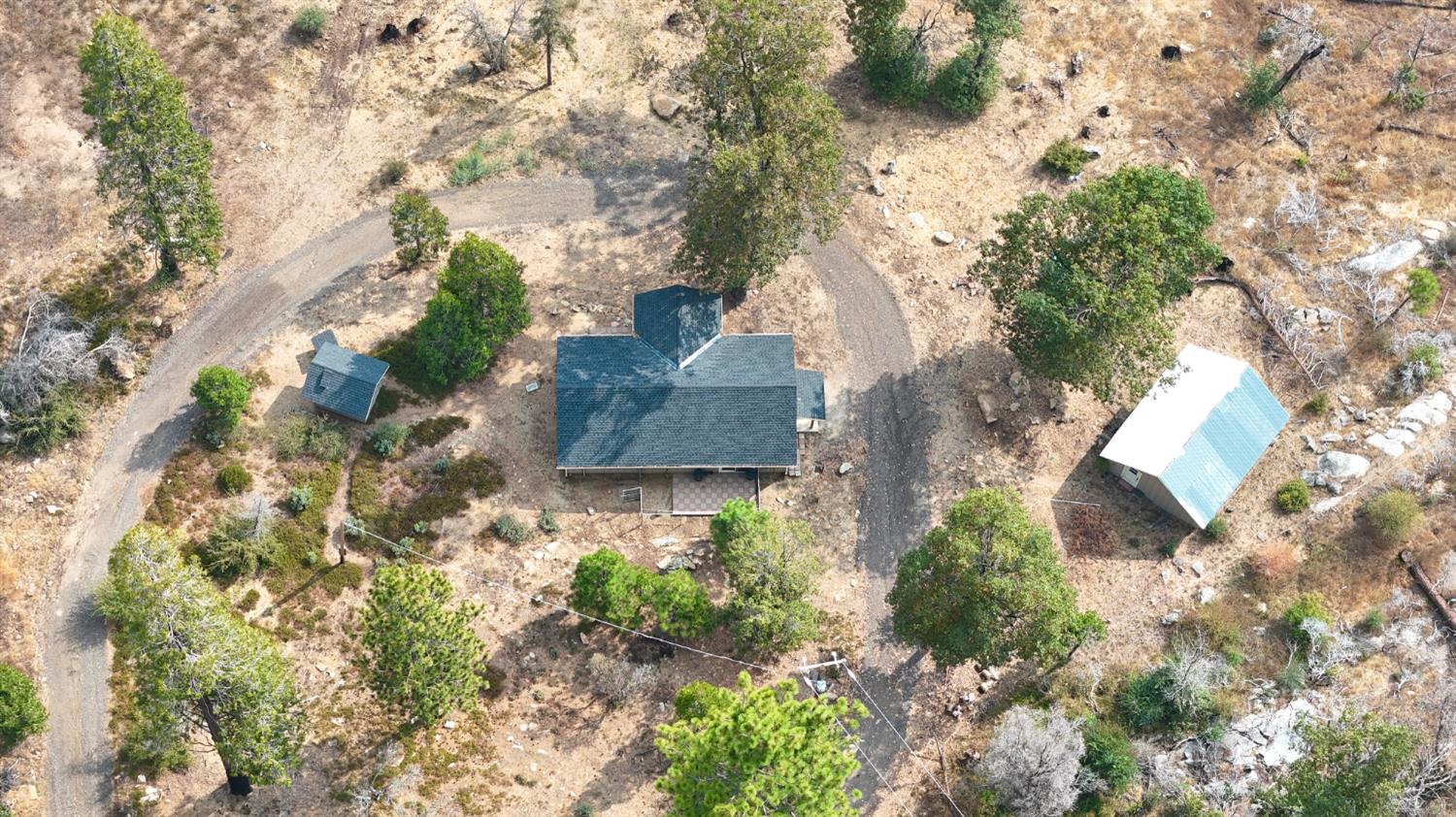 38295 Cressman Road Shaver Lake, CA 93664 - Photo 30 of 31 an aerial view of residential house with outdoor space