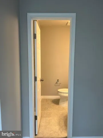 a bathroom with a toilet