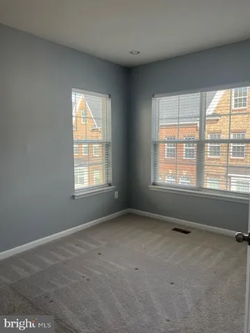 a bathroom with a sink and a large mirror